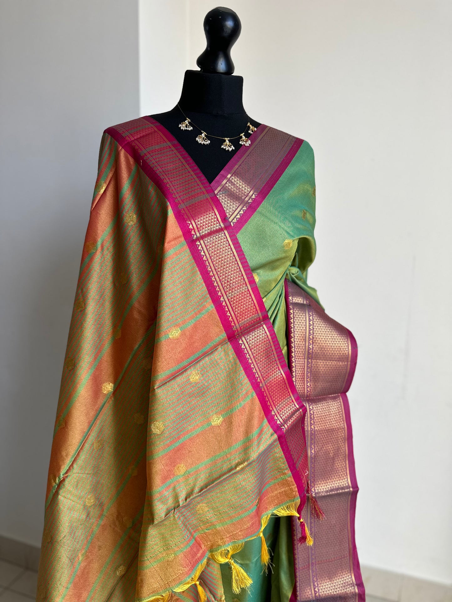Green and pink colour saree with gold zari border and buti. Traditional semi silk saree beautiful colour and design. Designer saree