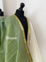 Elegant white cotton saree with green zari border LaiLai Sarees