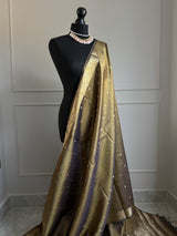 Dual tone tissue silk saree with zari border and brocade blouse