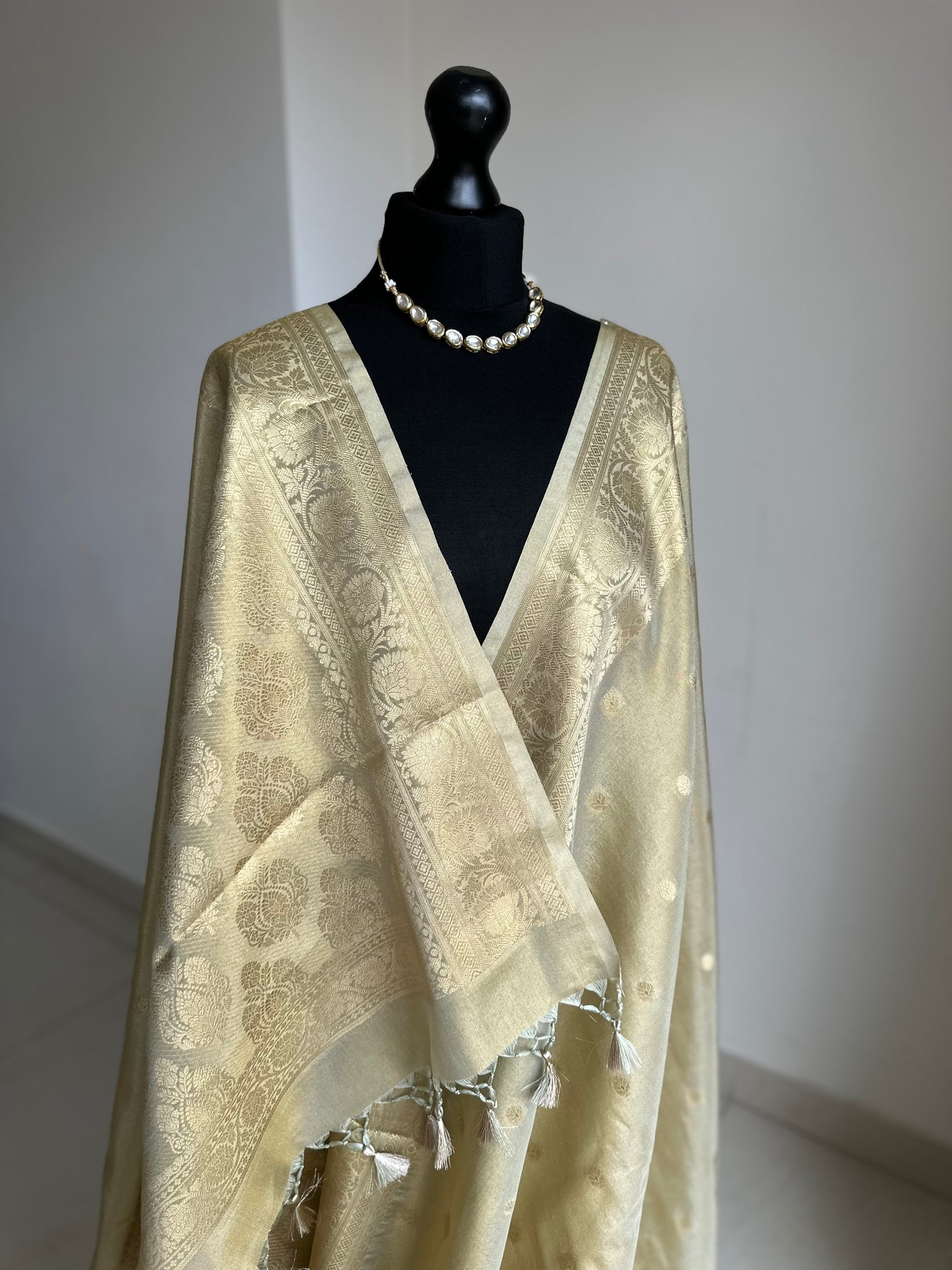 Ivory cream and Gold Tissue Saree: Soft to drape with zari border and butas