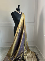 Dual tone tissue silk saree with zari border and brocade blouse
