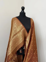 Golden brown dual toned shimmer soft tissue saree with border and unstitched brocade blouse. LaiLai Sarees
