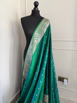 Banarasi silk peacock green and blue dual tone wedding saree with gold zari. Exquisite silk saree with plain contrast blouse. Stylish elegant and evergreen LaiLai Sarees
