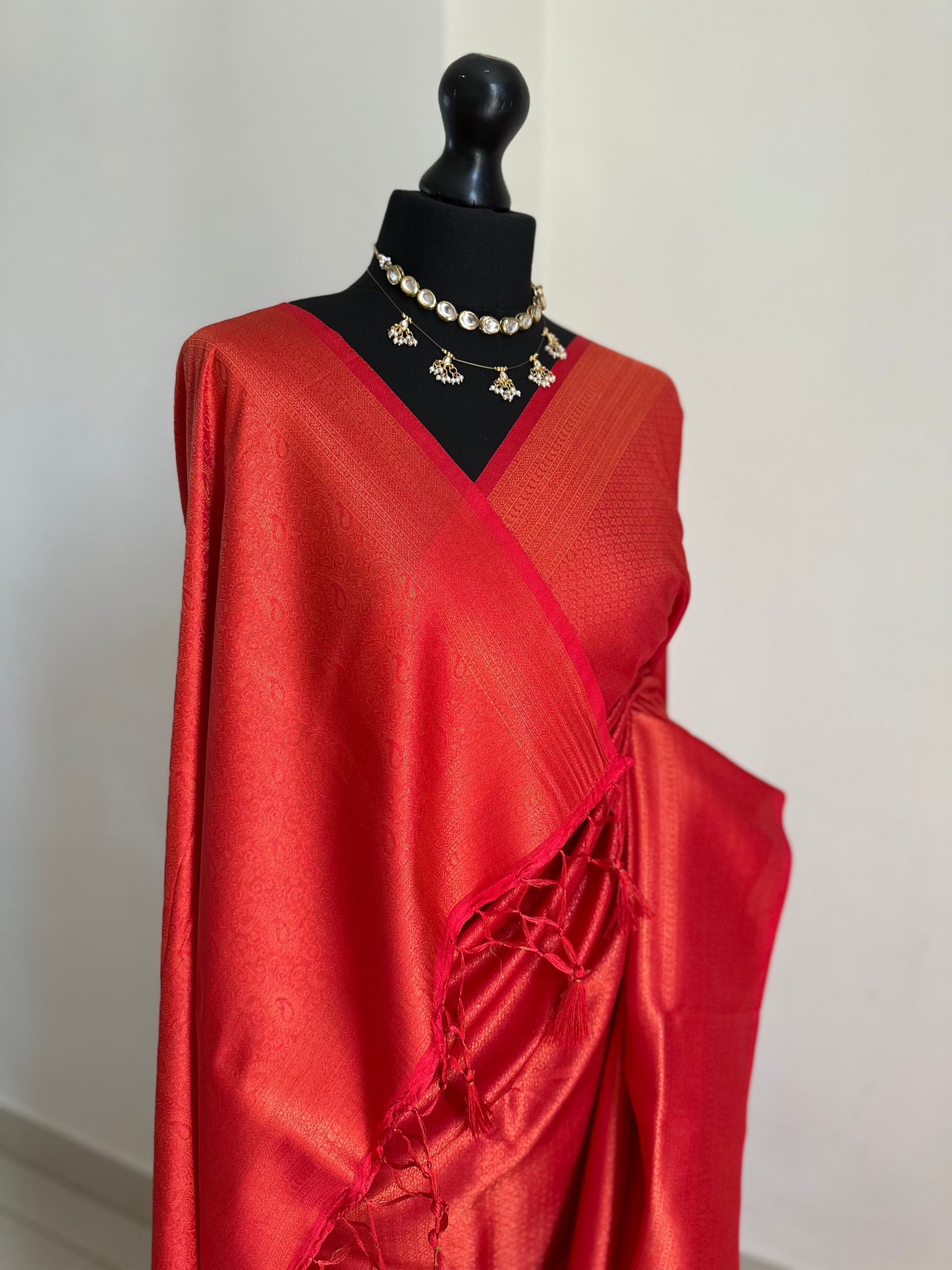 Red softy silk kubera pattu saree with an exquisite sheen and classy look. Perfect red shade saree suitable for wedding parties and events