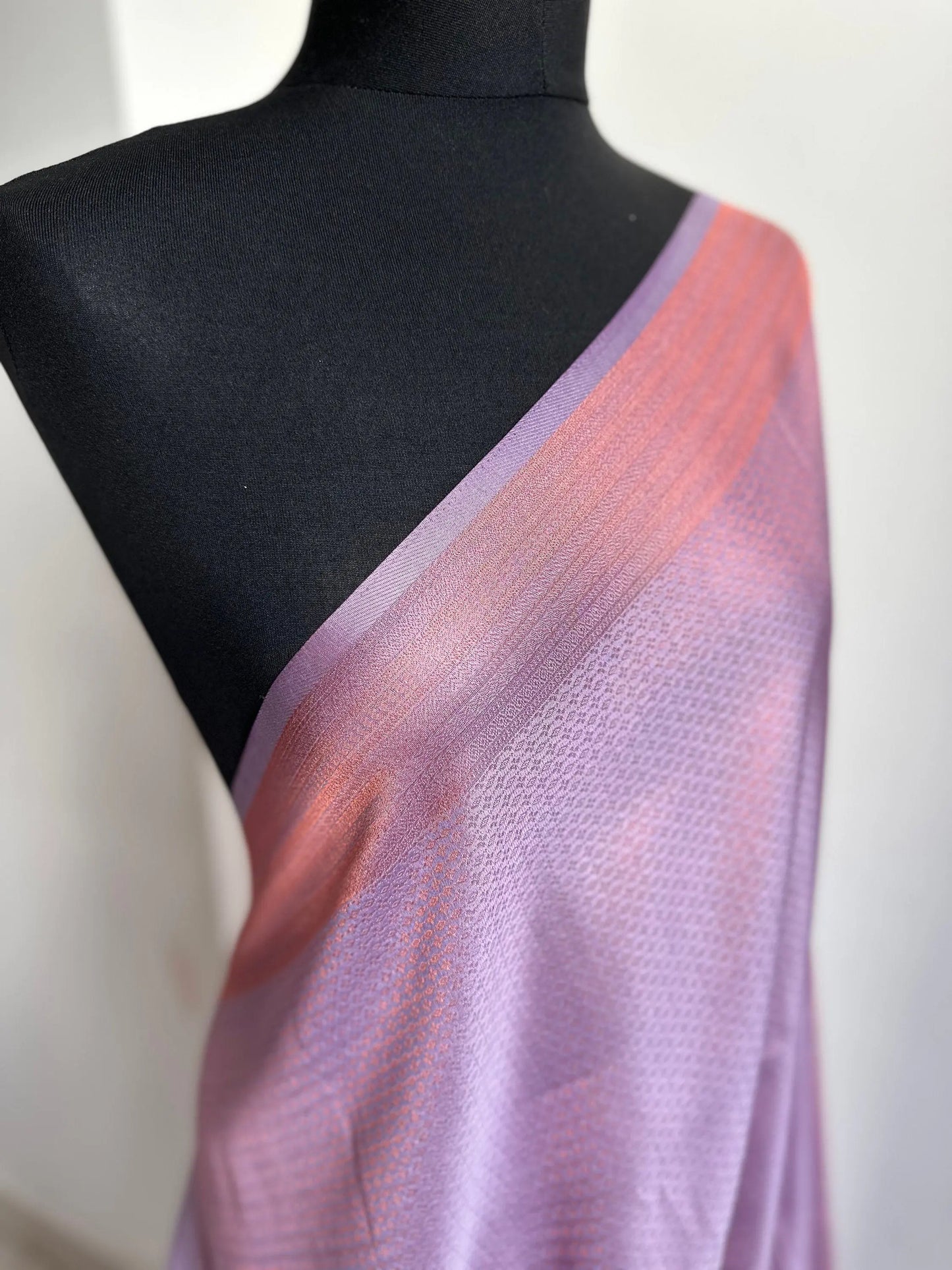 Lilac soft silk saree with a copper border and all over sheen. The perfect saree for parties and all traditional events. Versatile saree - LaiLai Sarees