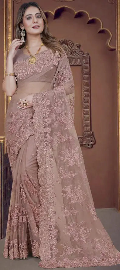 Nude pink lace saree for parties. Intricate lace designer saree with matching petticoat and blouse unstitched. Wedding or party saree - LaiLai Sarees