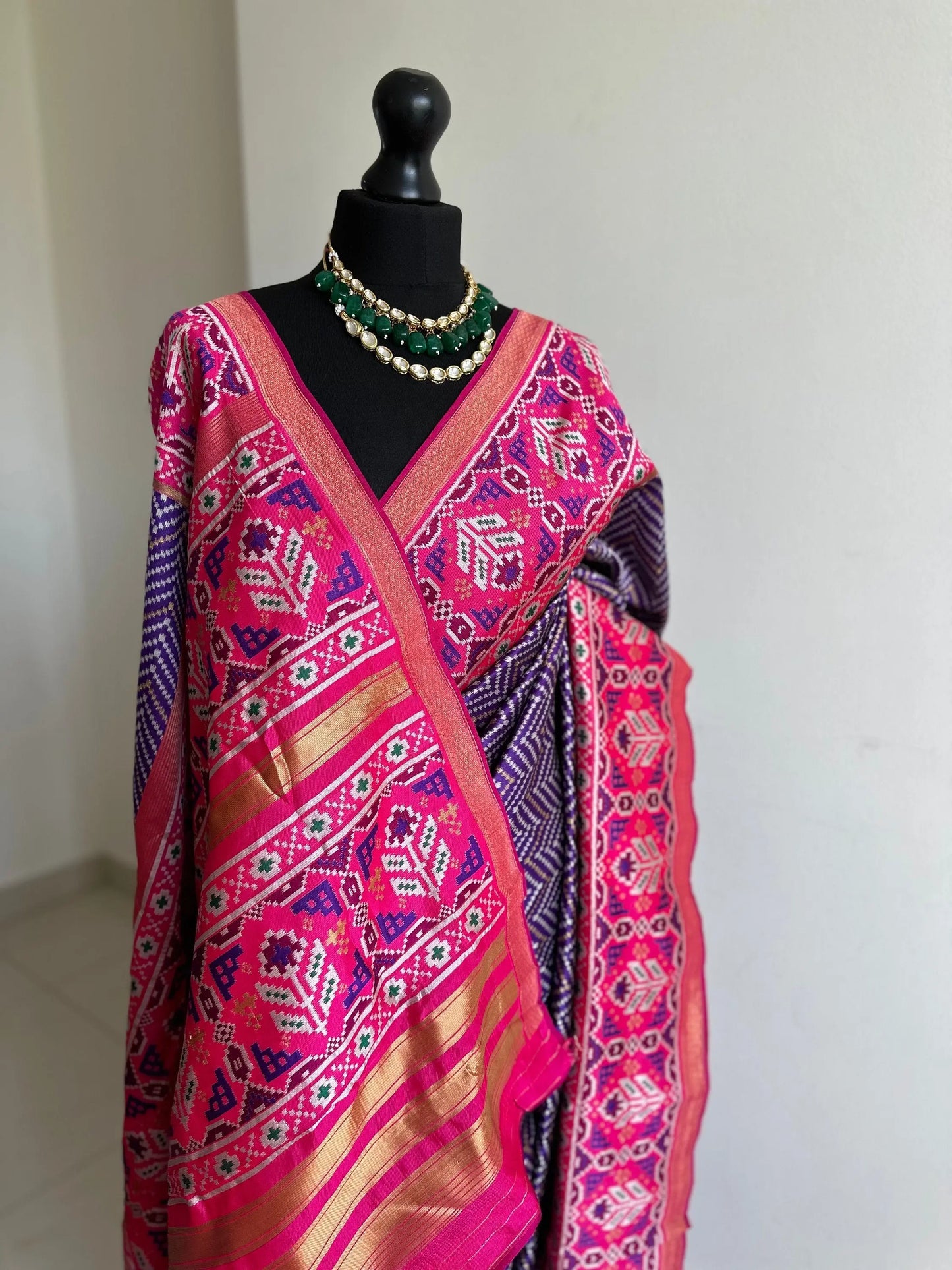 Purple and pink silk patola saree with printed and weaved zari work. Designer saree with blouse for weddings. Designer saree blouse - LaiLai Sarees