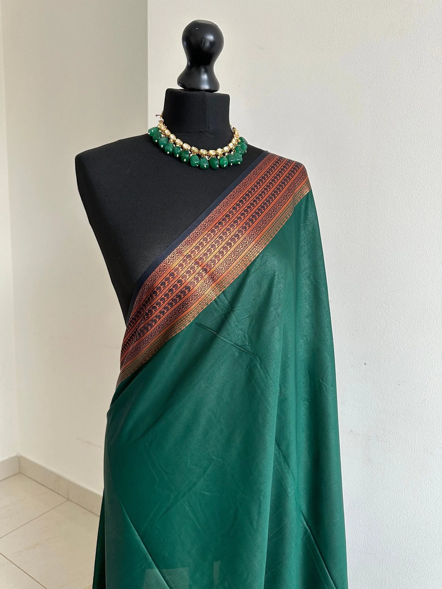 Dark green saree with copper border and navy pallu and blouse. Traditional crepe silk saree. Casual saree soft to drape pleat bottle green - LaiLai Sarees