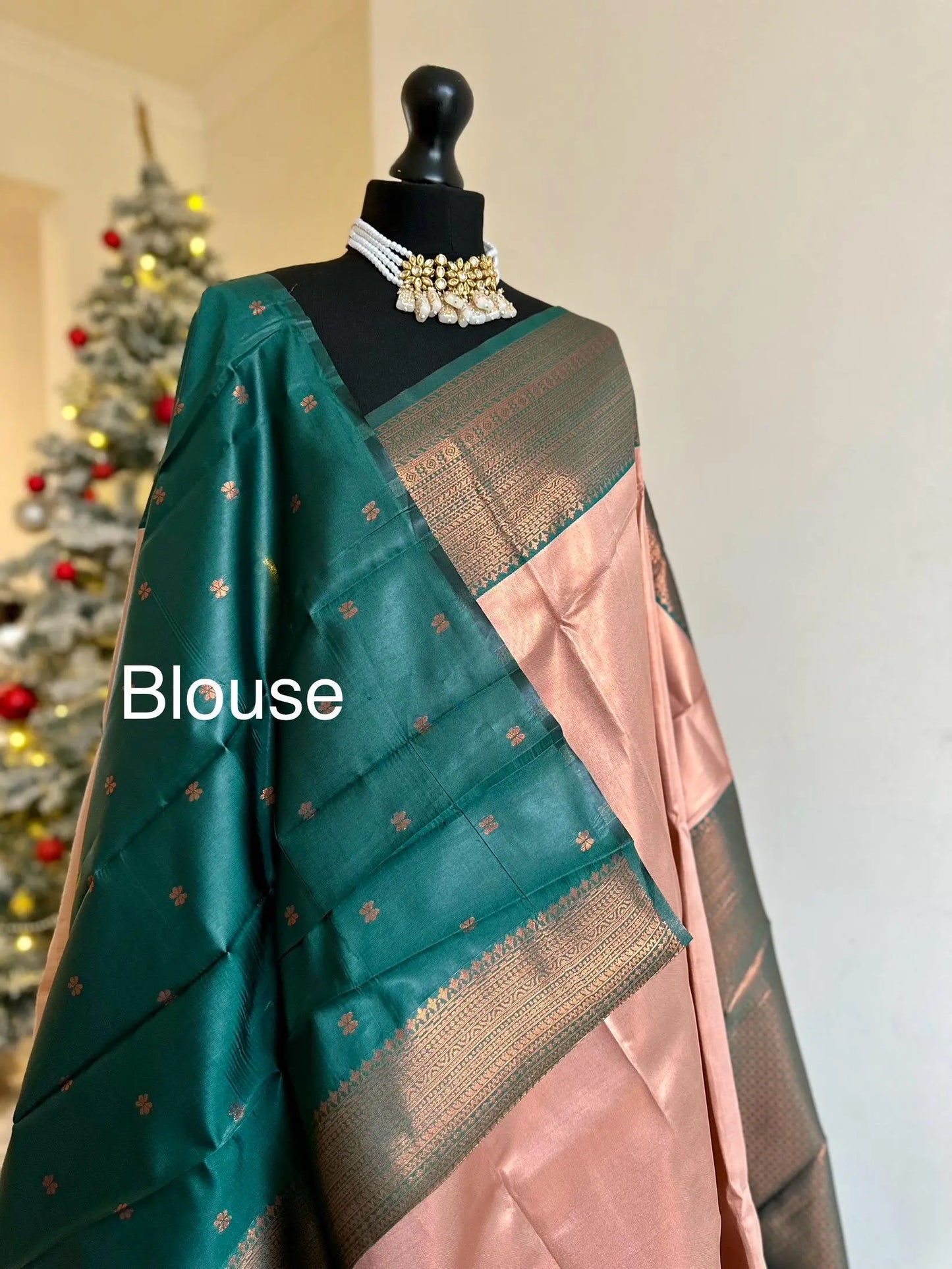 Semi silk peach pink saree with green border and copper motifs. Modern and traditional silk saree beautiful colour and design.Designer saree - LaiLai Sarees