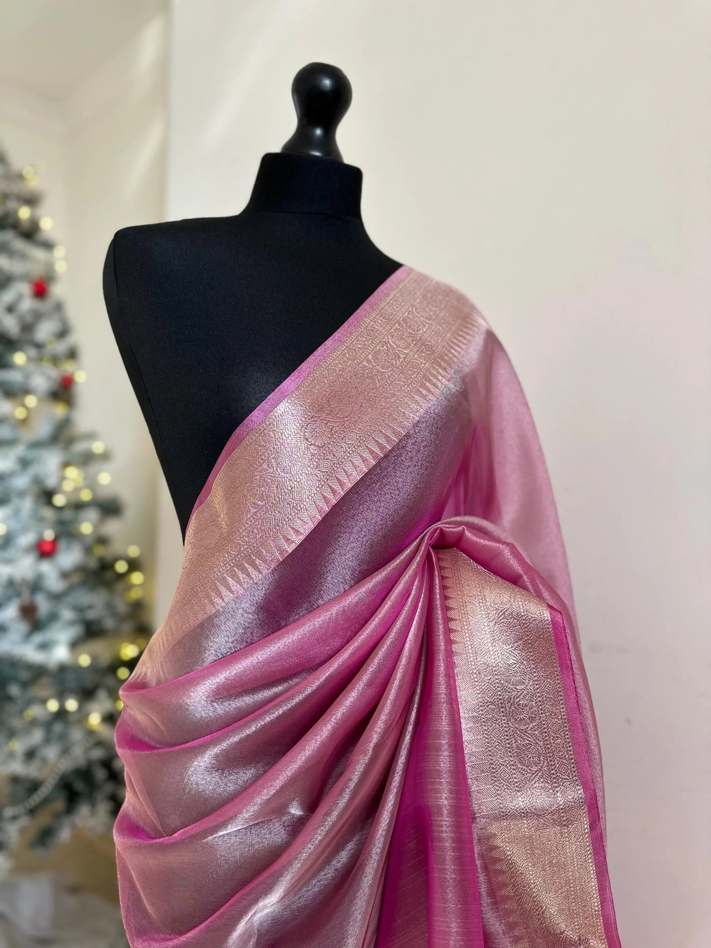 Pale pink shimmer soft tissue saree with border and unstitched blouse. Soft pink wedding guest party traditional saree unique saree look - LaiLai Sarees