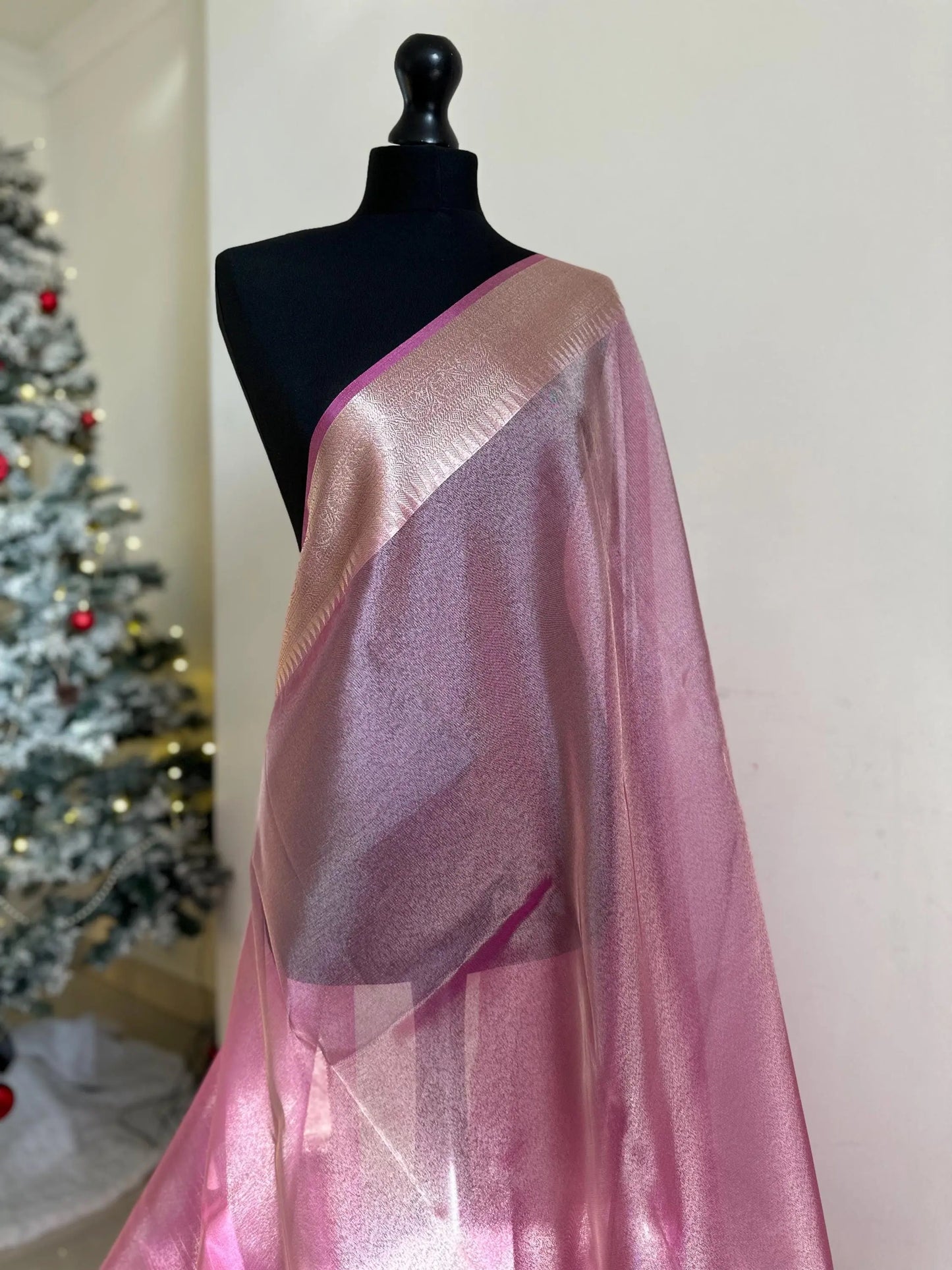 Pale pink shimmer soft tissue saree with border and unstitched blouse. Soft pink wedding guest party traditional saree unique saree look - LaiLai Sarees