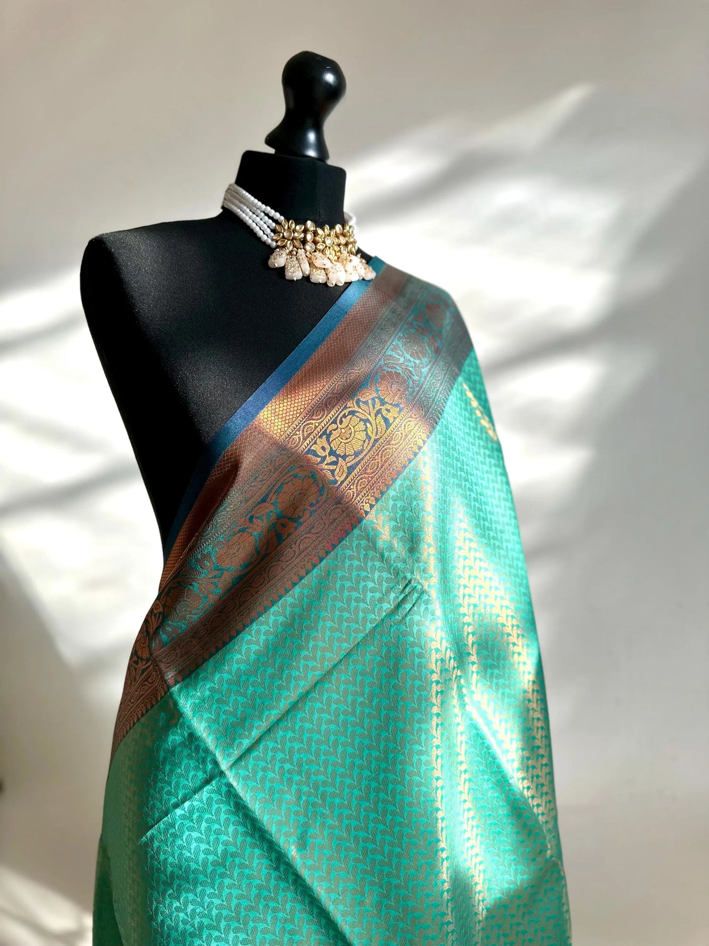 Authentic green saree with navy blue border copper zari and sheen. Traditional silk saree beautiful colour and design. Designer saree - LaiLai Sarees
