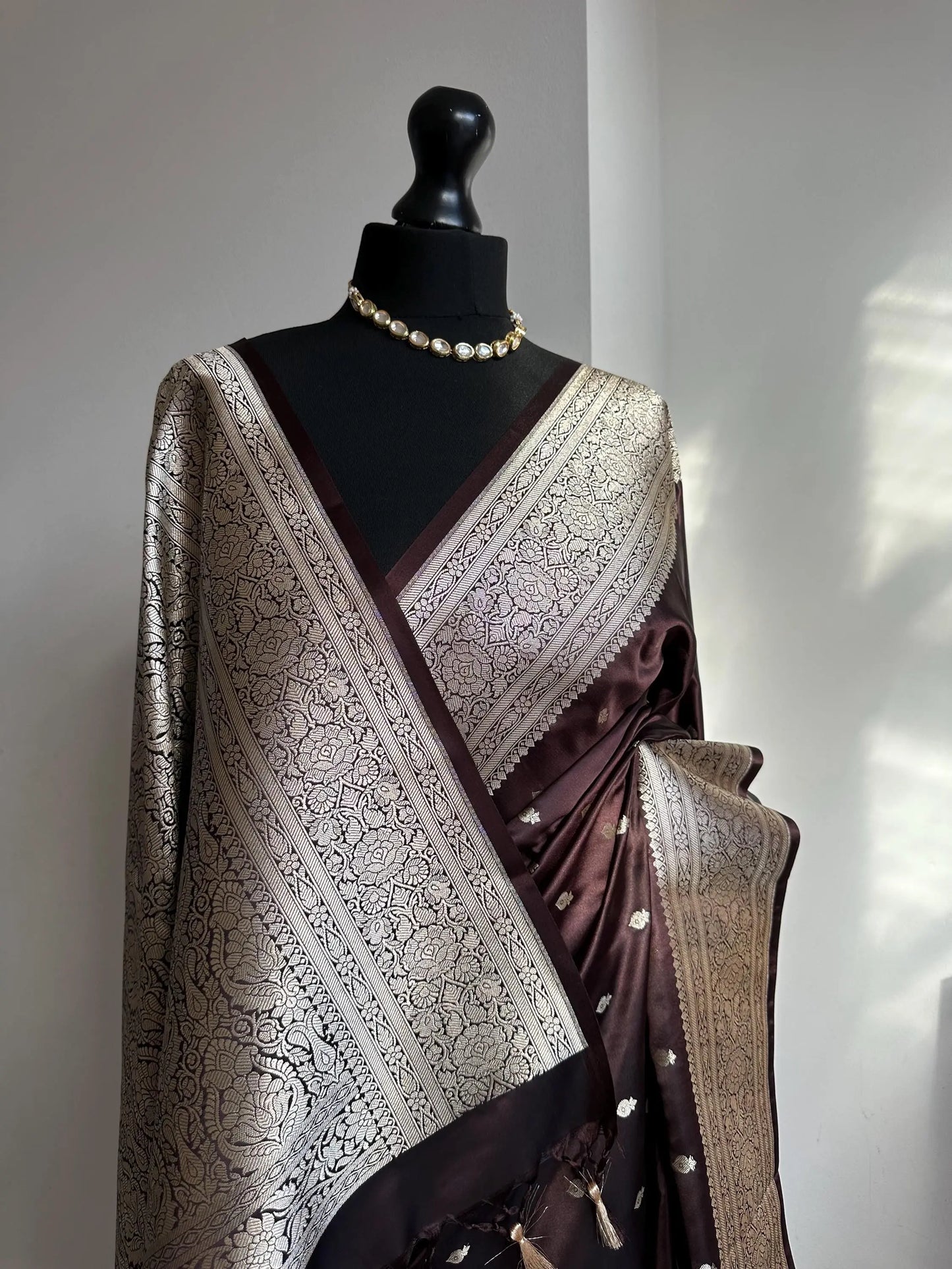Banarasi silk in dark chocolate brown with gold zari. Gold and brown traditional wedding saree with plain contrast blouse with cuff border - LaiLai Sarees