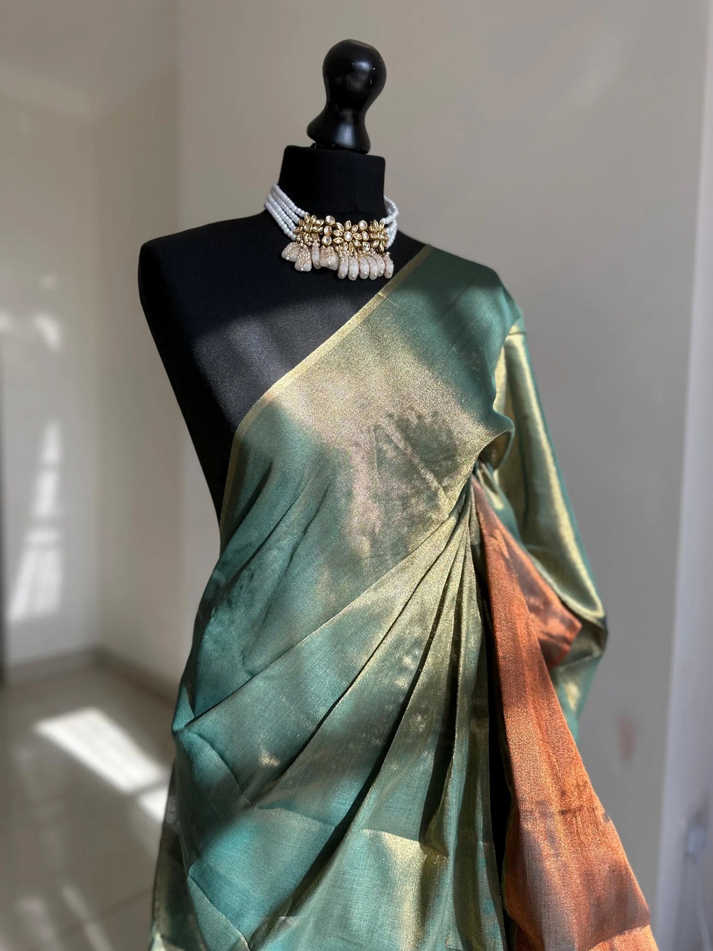Copper green dual toned shimmer soft tissue saree with contrast sequinned blouse. Soft and light saree for sophisticated and unique look - LaiLai Sarees