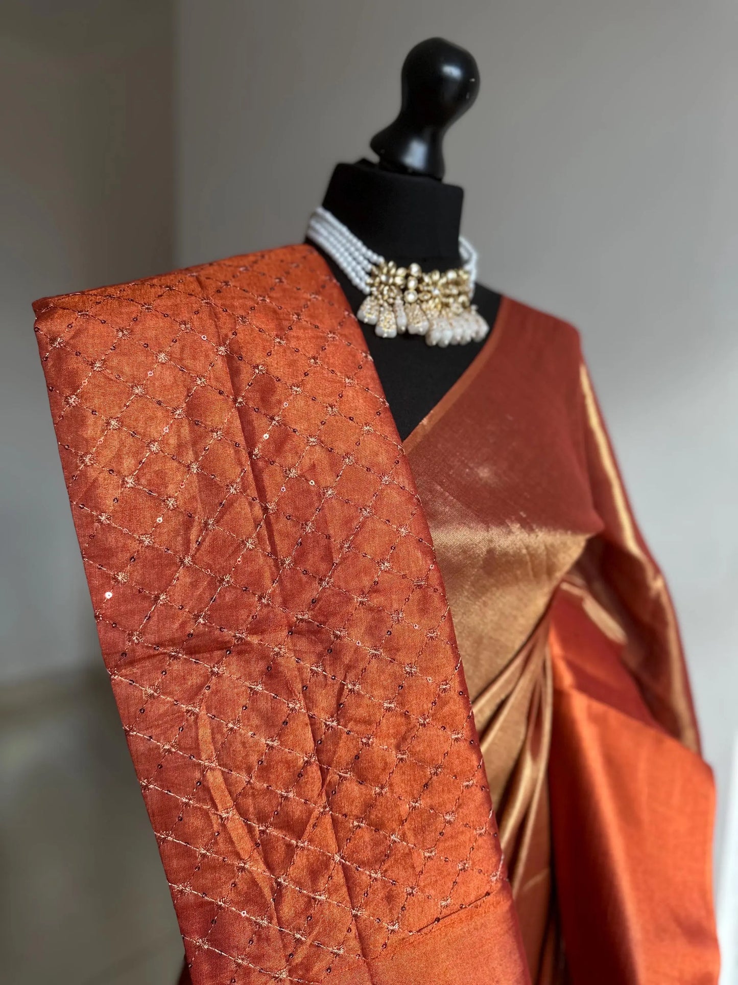 Copper red dual toned shimmer soft tissue saree with contrast sequinned blouse. Soft and light saree for sophisticated and unique look - LaiLai Sarees