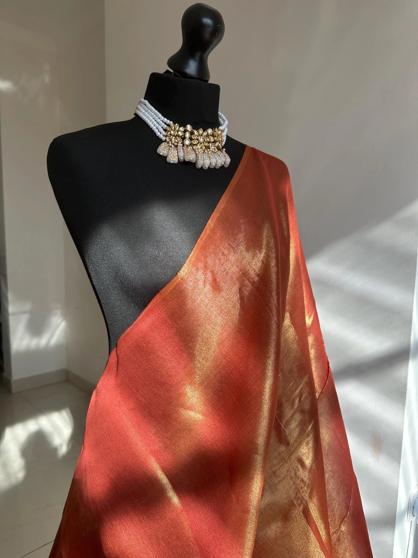 Copper red dual toned shimmer soft tissue saree with contrast sequinned blouse. Soft and light saree for sophisticated and unique look - LaiLai Sarees