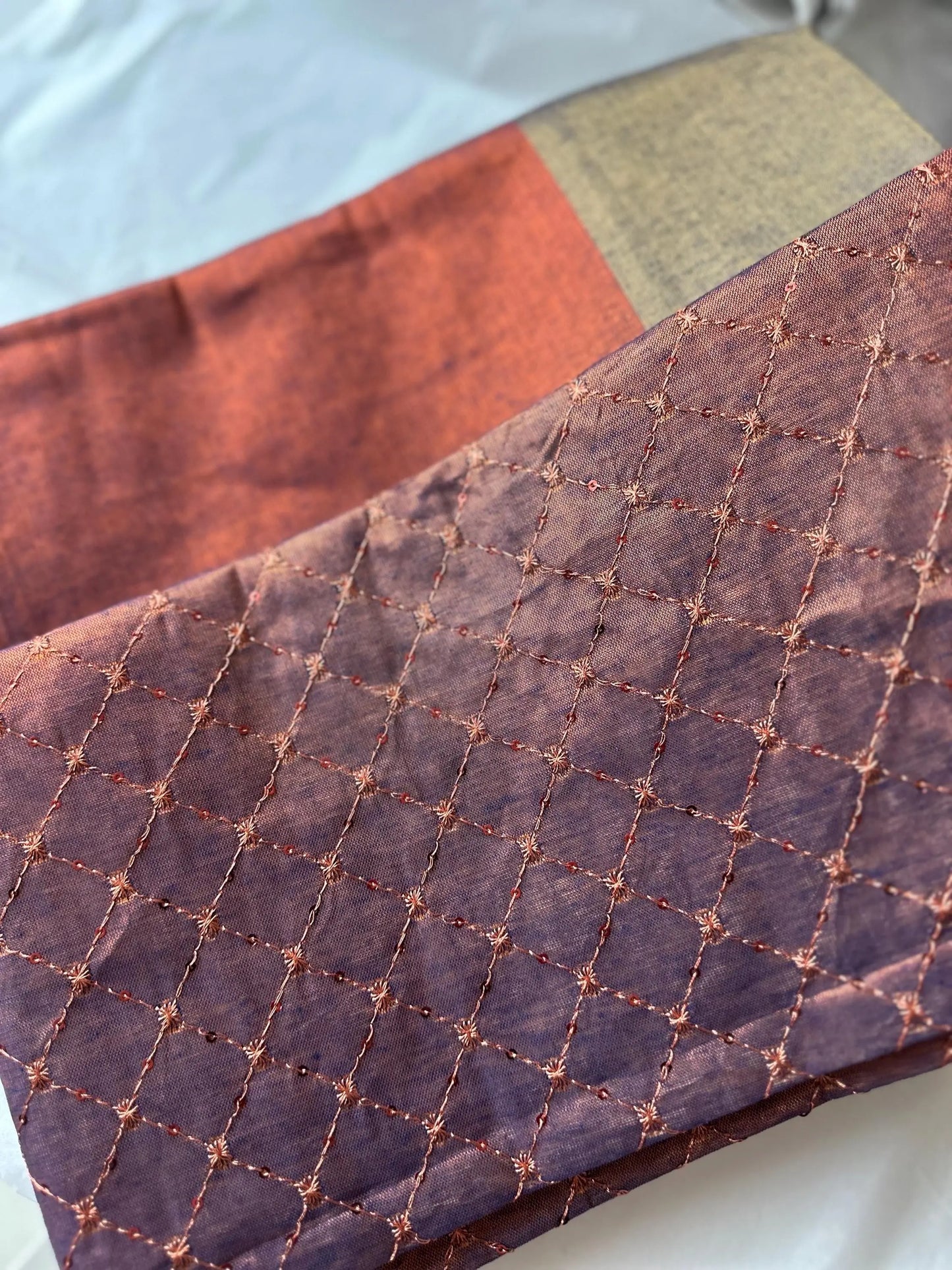 Copper earthy dual toned shimmer soft tissue saree with contrast sequinned blouse. Soft and light saree for sophisticated and unique look - LaiLai Sarees