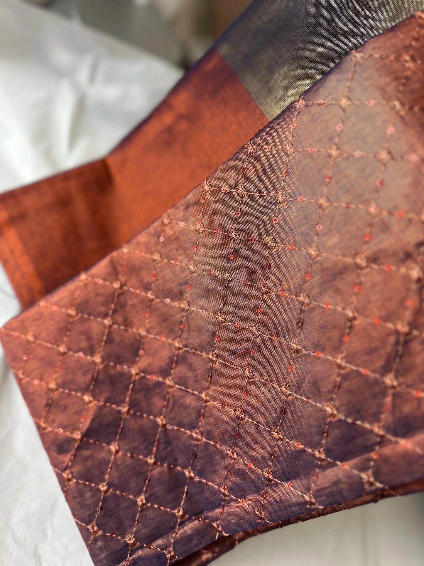Copper earthy dual toned shimmer soft tissue saree with contrast sequinned blouse. Soft and light saree for sophisticated and unique look - LaiLai Sarees