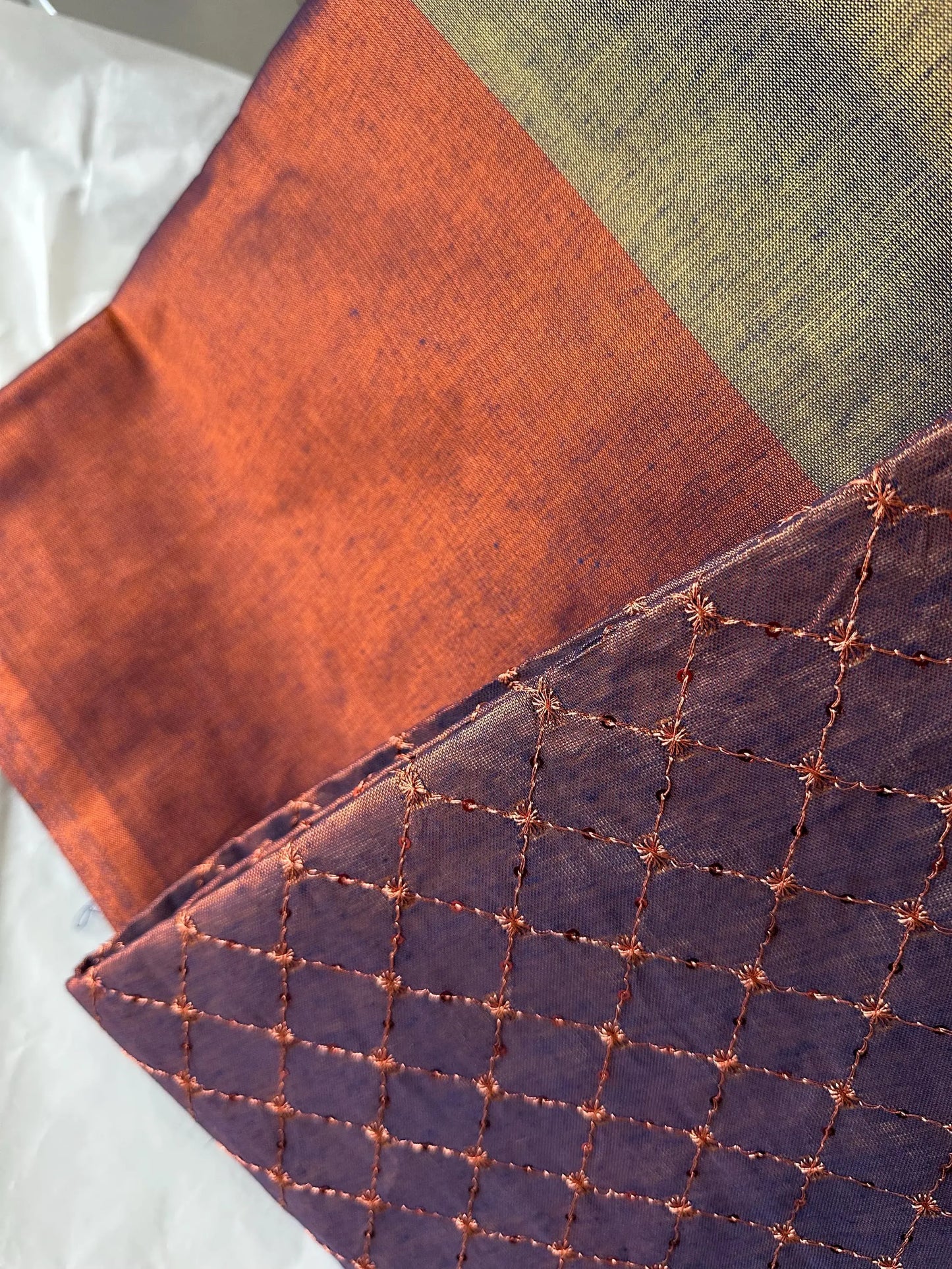 Copper earthy dual toned shimmer soft tissue saree with contrast sequinned blouse. Soft and light saree for sophisticated and unique look - LaiLai Sarees
