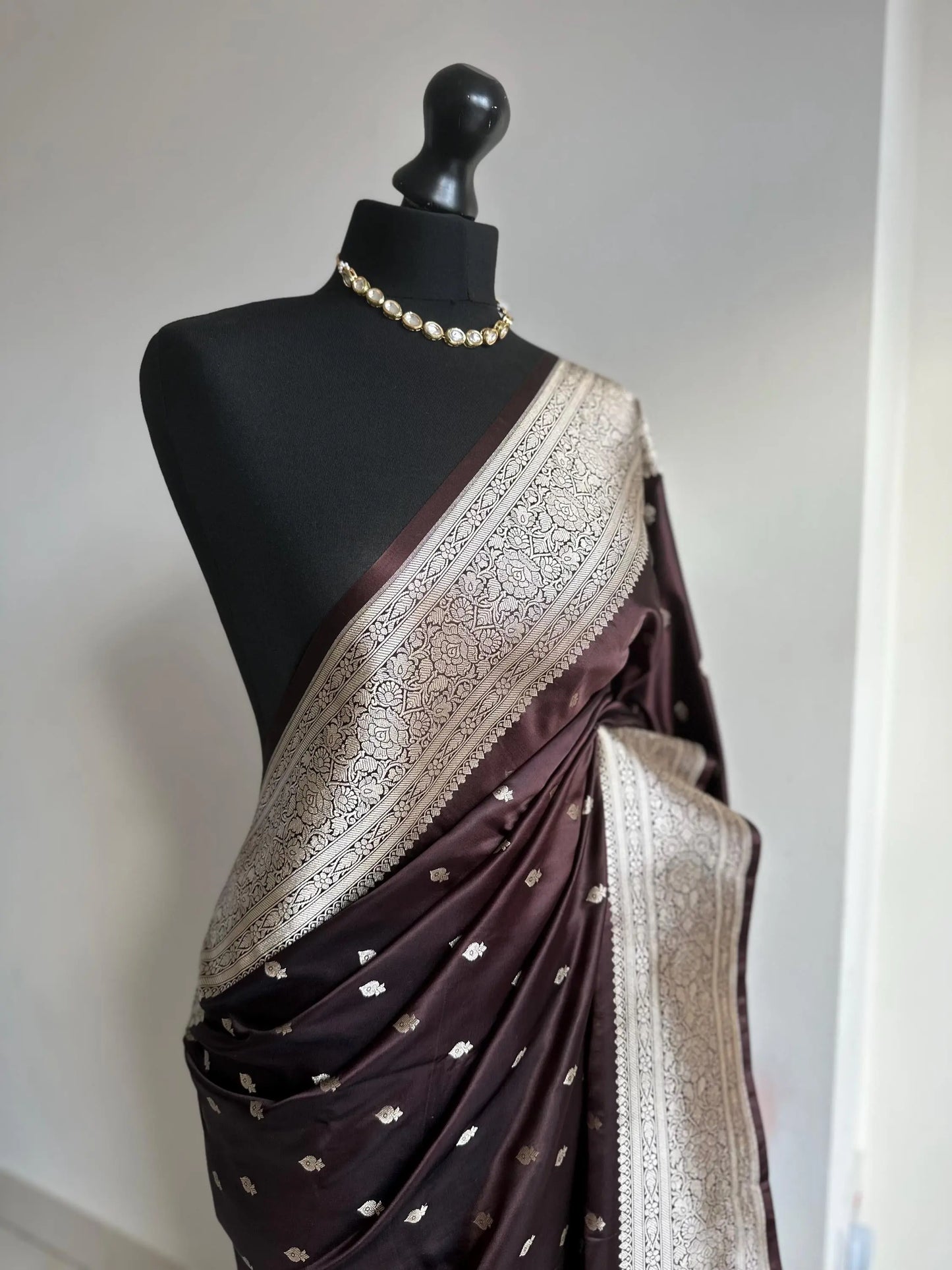 Banarasi silk in dark chocolate brown with gold zari. Gold and brown traditional wedding saree with plain contrast blouse with cuff border - LaiLai Sarees