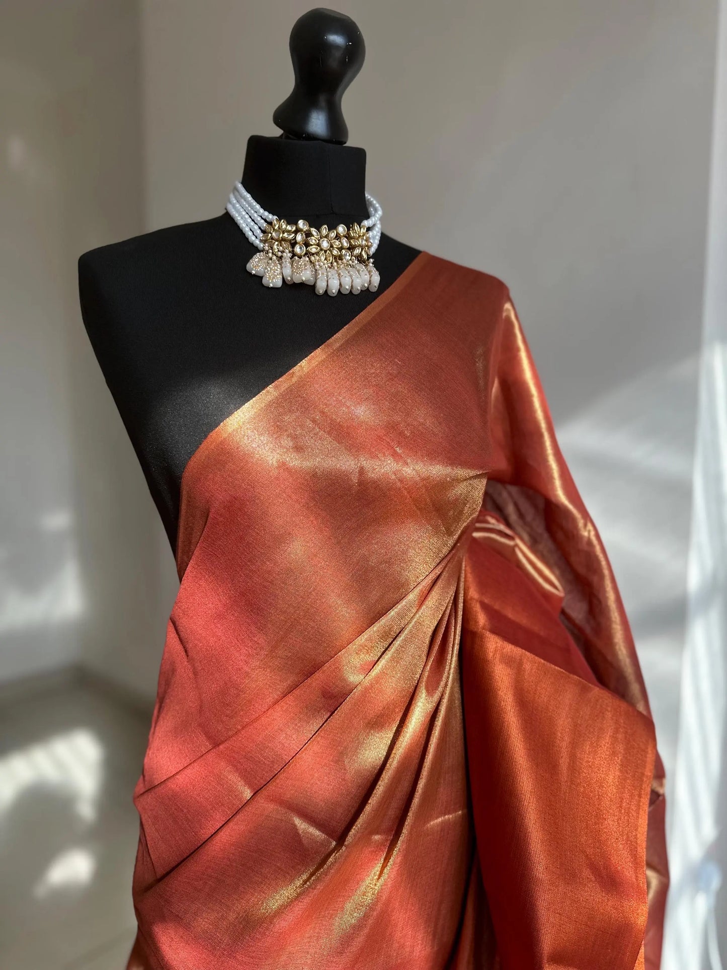 Copper red dual toned shimmer soft tissue saree with contrast sequinned blouse. Soft and light saree for sophisticated and unique look - LaiLai Sarees