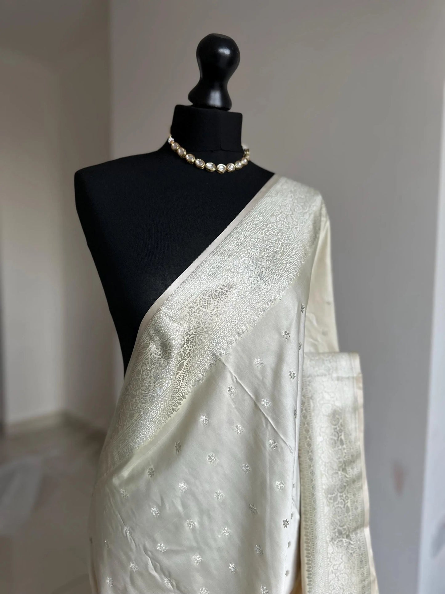 Banarasi silk cream wedding saree with silver zari. Silver and cream designer and traditional saree with plain contrast blouse. - LaiLai Sarees