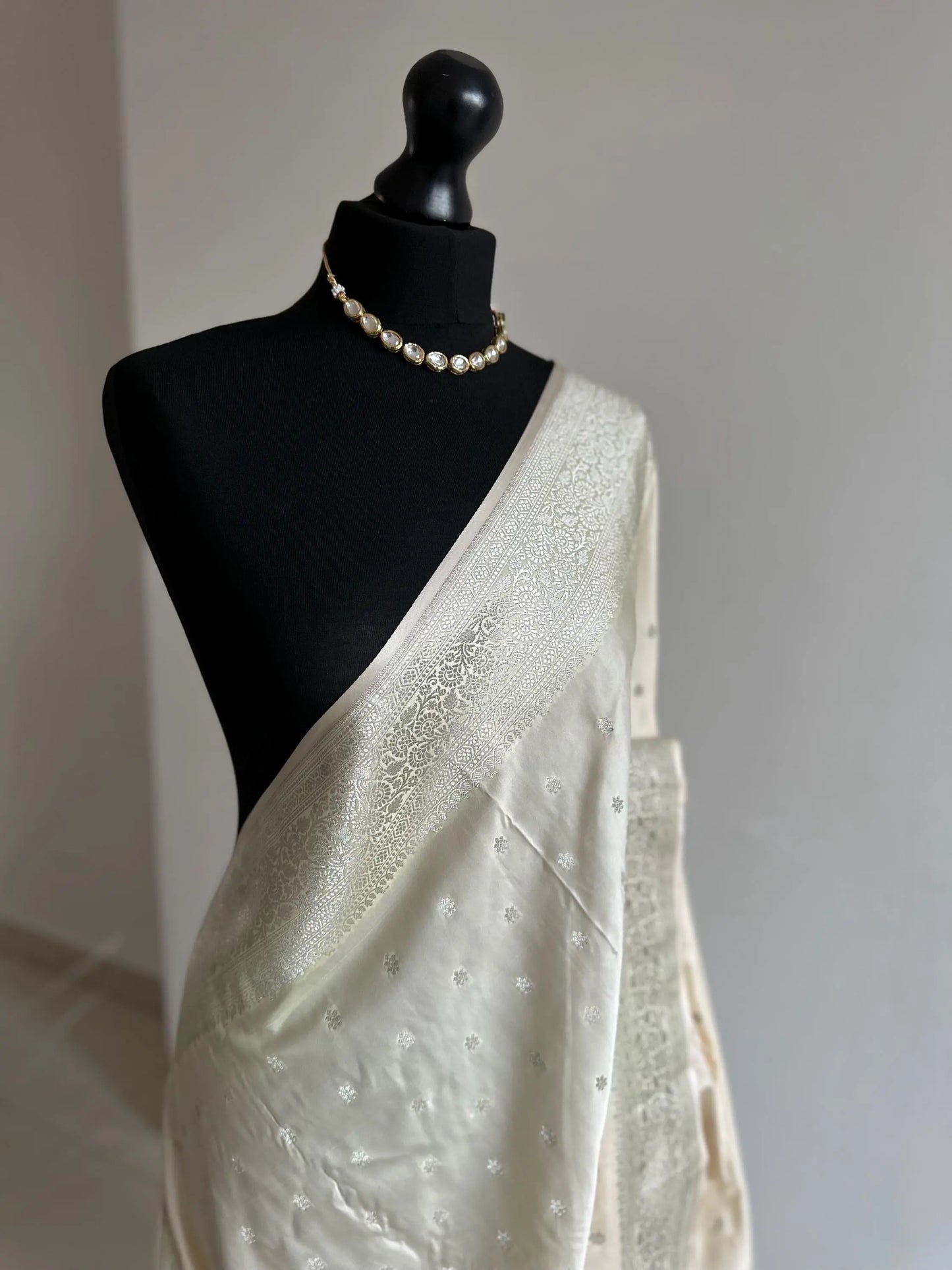 Banarasi silk cream wedding saree with silver zari. Silver and cream designer and traditional saree with plain contrast blouse. - LaiLai Sarees