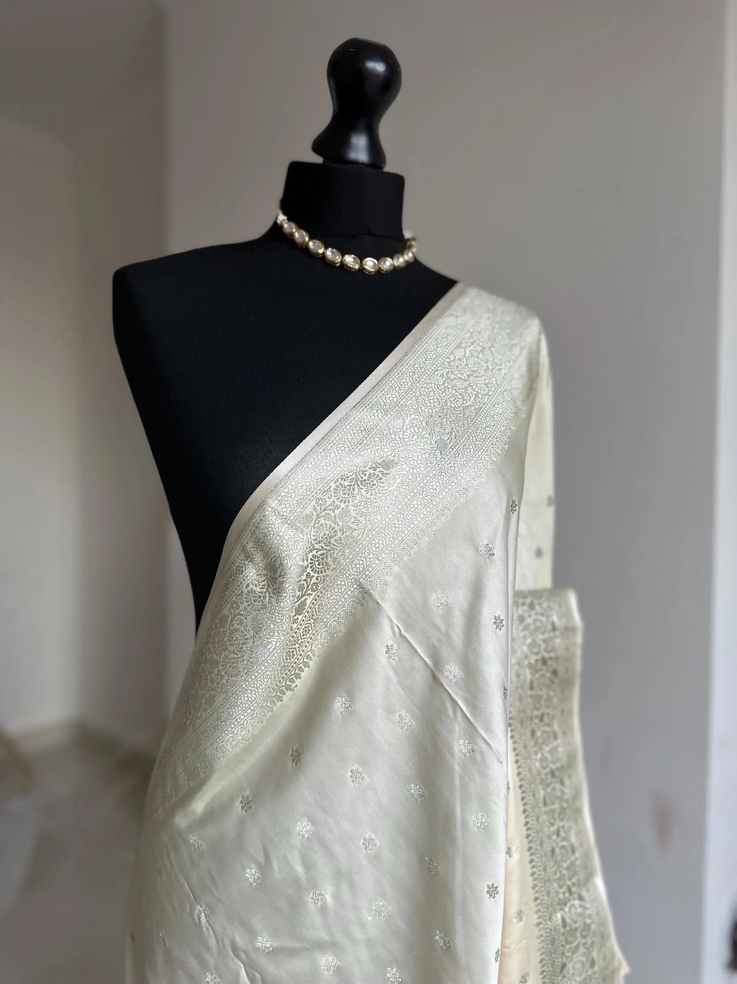 Banarasi silk cream wedding saree with silver zari. Silver and cream designer and traditional saree with plain contrast blouse. - LaiLai Sarees