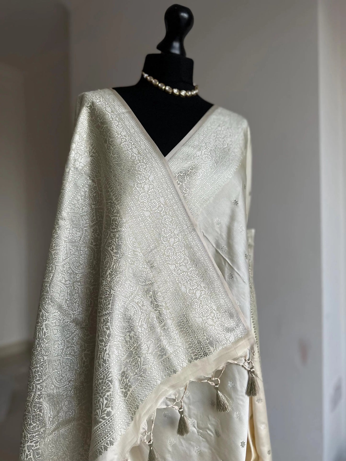 Banarasi silk cream wedding saree with silver zari. Silver and cream designer and traditional saree with plain contrast blouse. - LaiLai Sarees