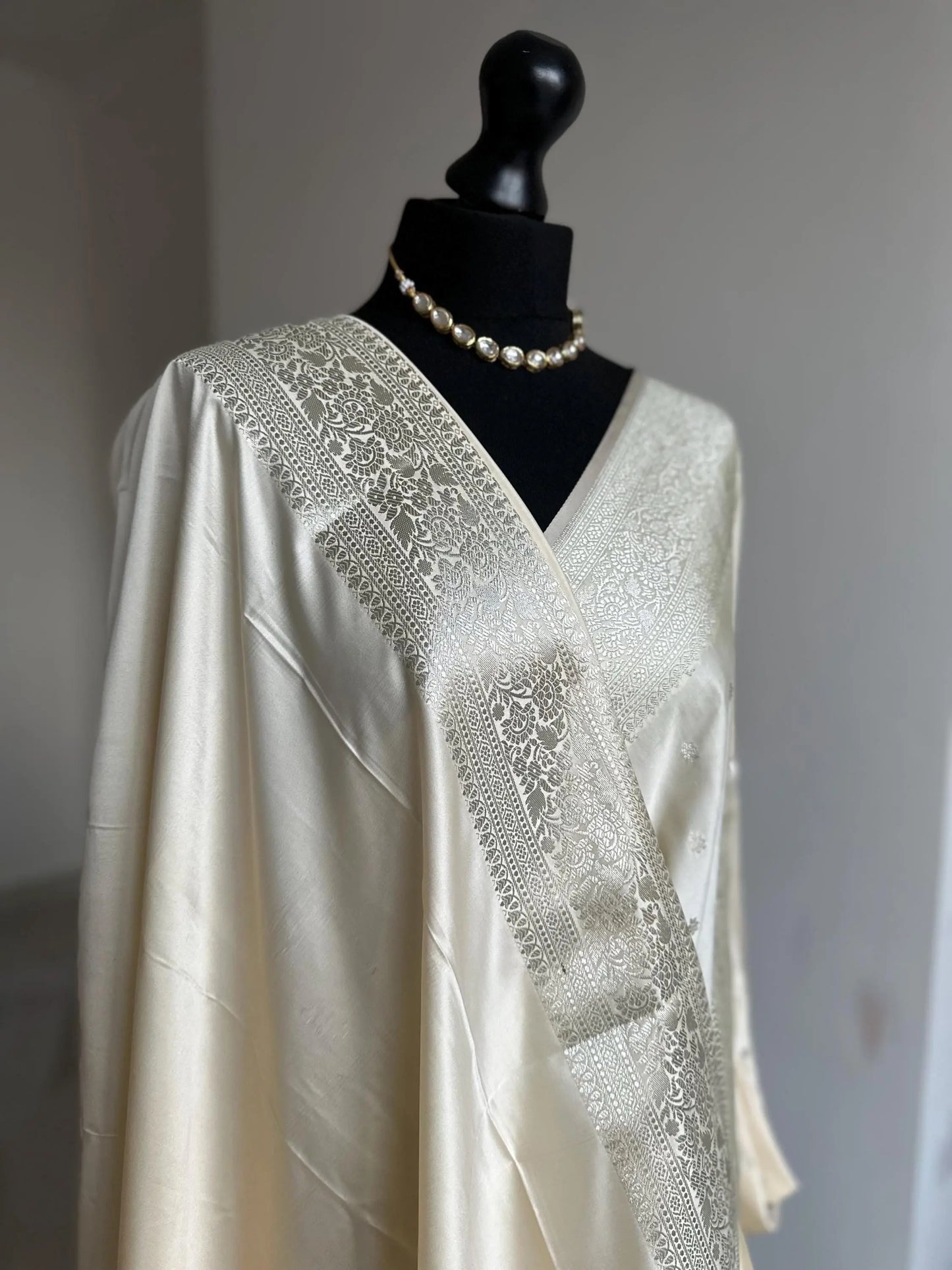 Banarasi silk cream wedding saree with silver zari. Silver and cream designer and traditional saree with plain contrast blouse. - LaiLai Sarees