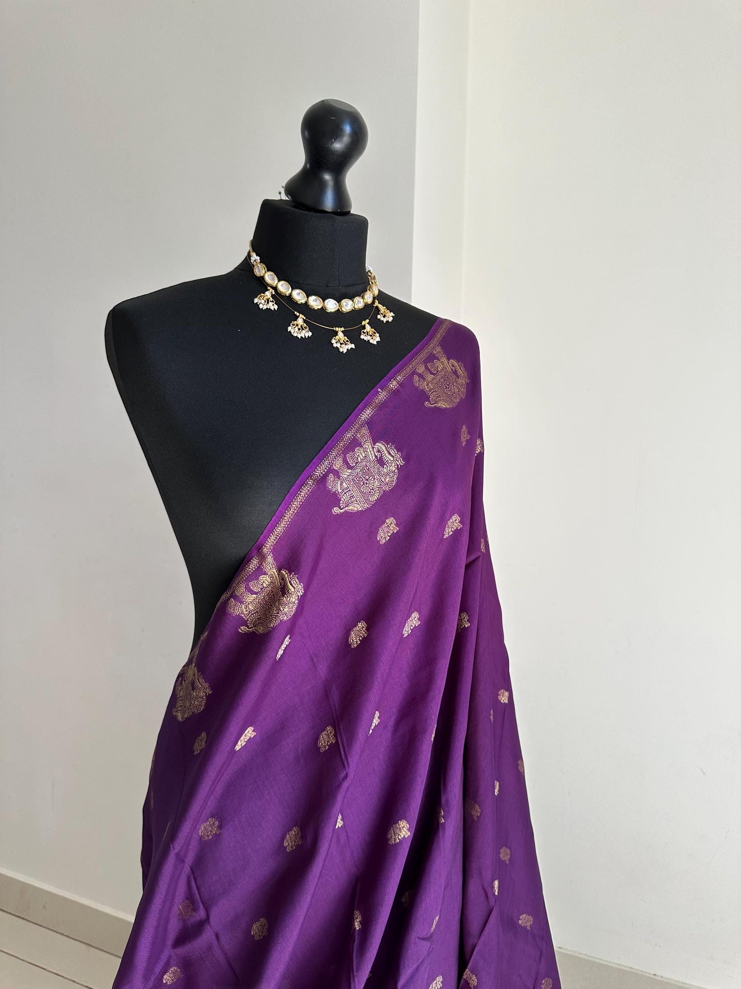 Purple semi silk saree with subtle gold zari elephant border and polka dot blouse. Traditional Indian saree elegant festive wear