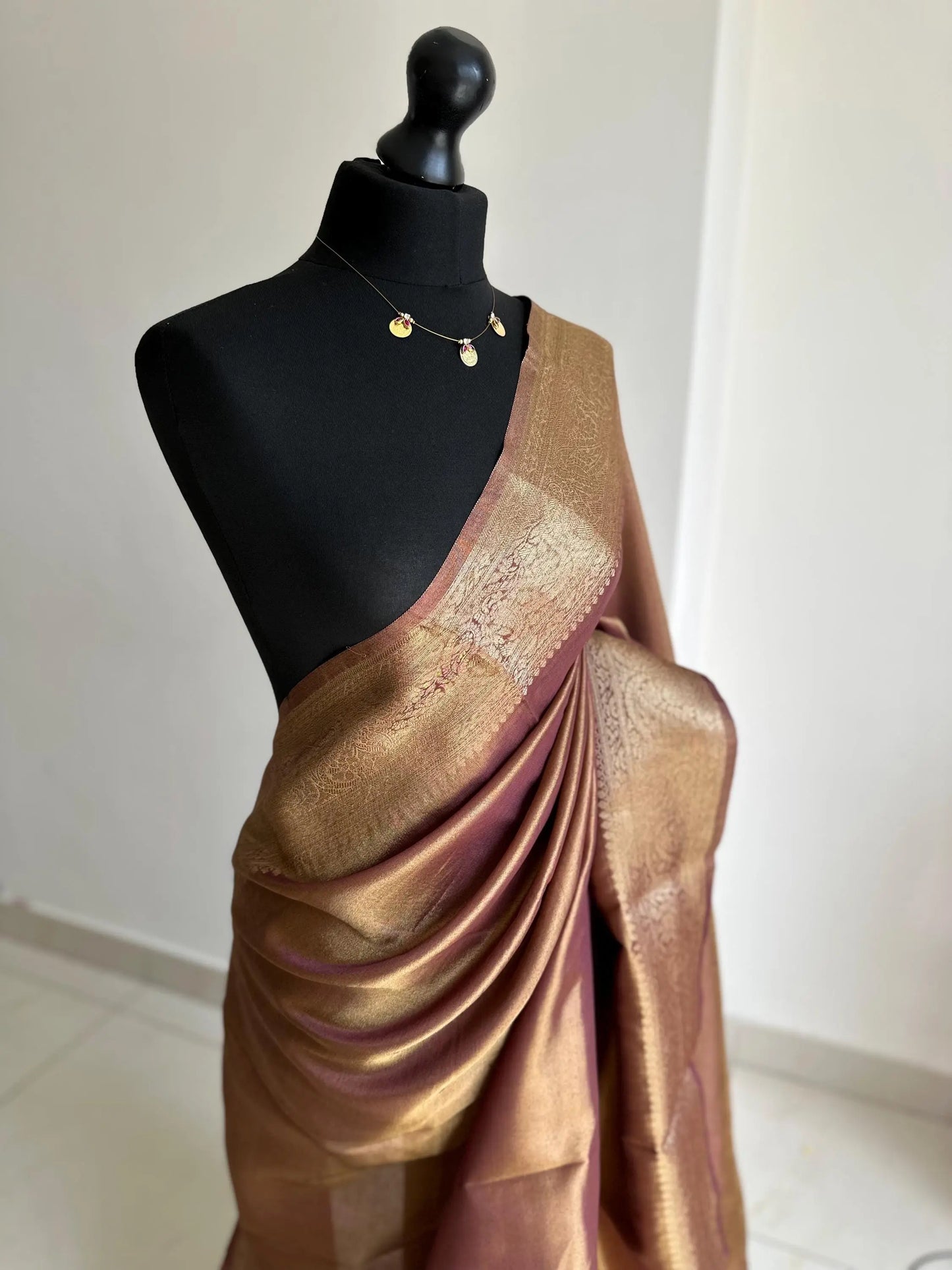 Gold and maroon dual toned plain shimmer soft tissue saree with border and unstitched blouse. Elegant wedding guest saree unique saree look LaiLai Sarees