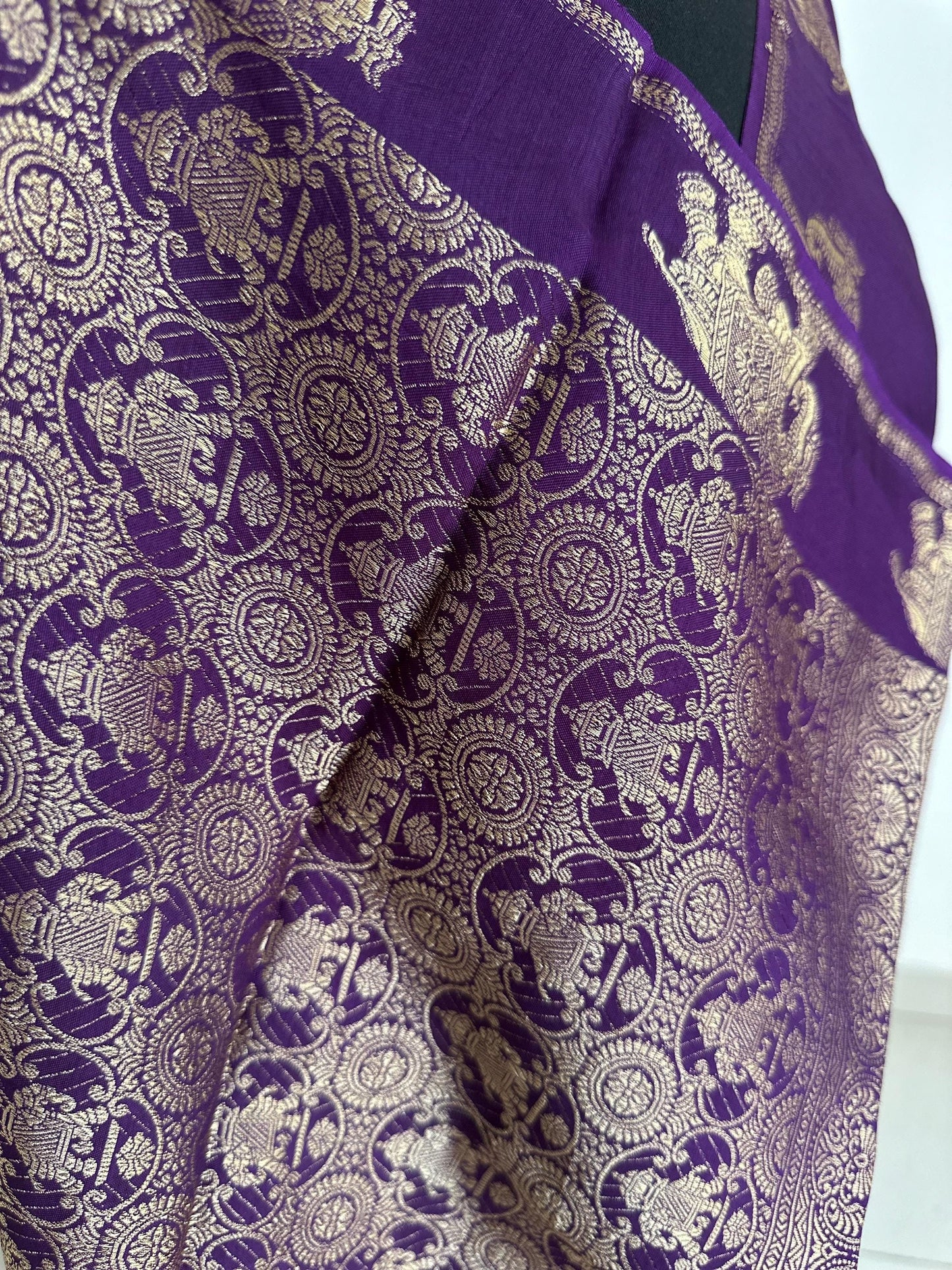 Purple semi silk saree with subtle gold zari elephant border and polka dot blouse. Traditional Indian saree elegant festive wear