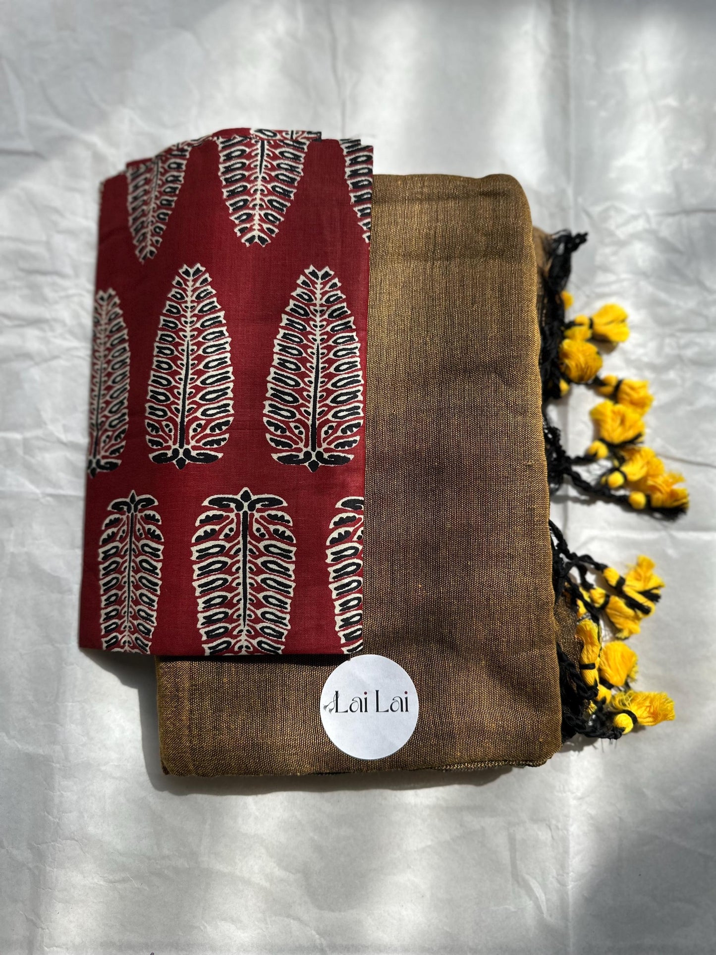 Black cotton handloom saree with yellow undertones and kalamkari art blouse. Very soft pure khadi cotton saree. Contrast printed blouse.