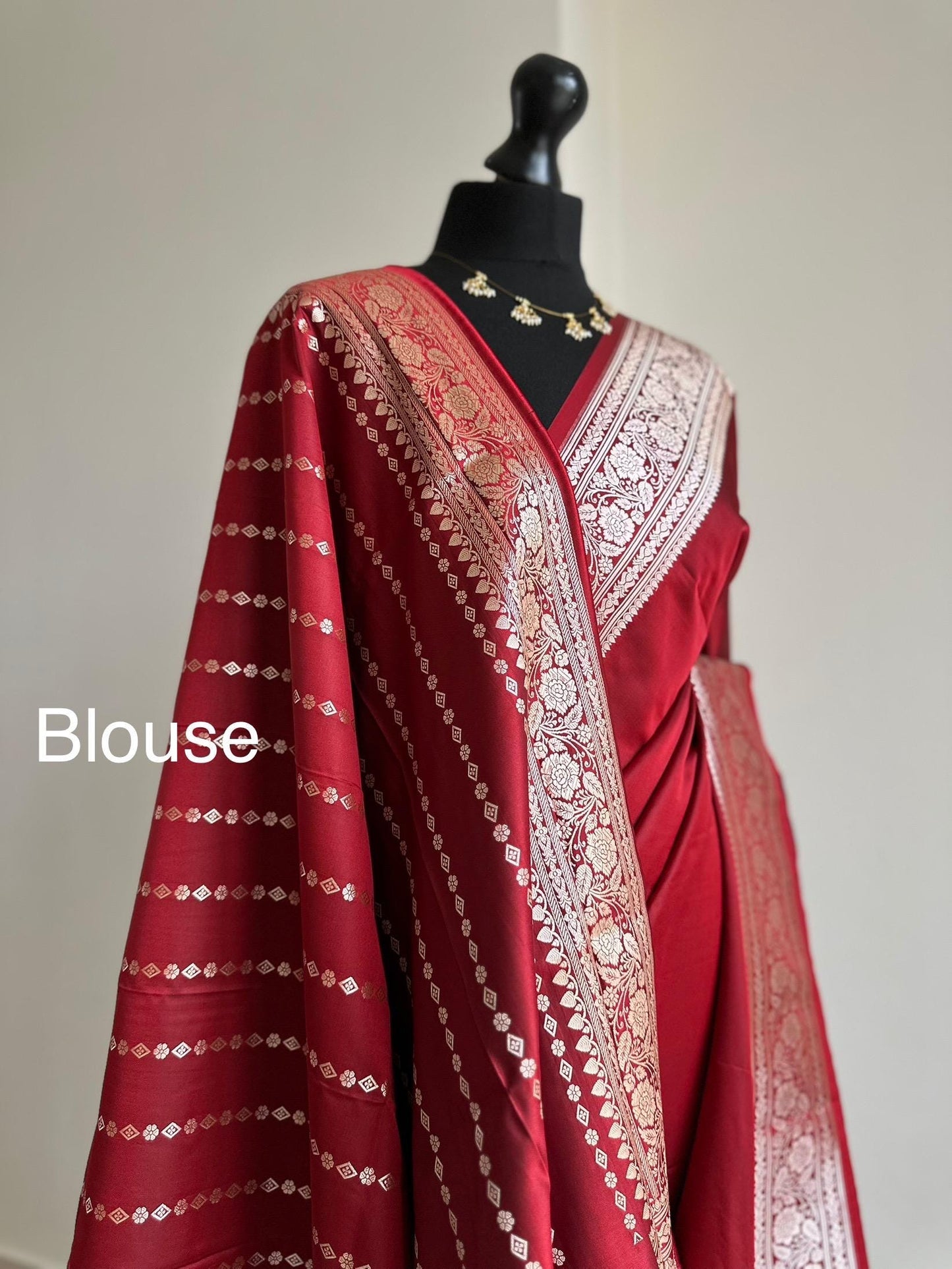 Banarasi silk crimson red katan wedding saree with gold zari. Red traditional silk saree with designer patterned blouse.