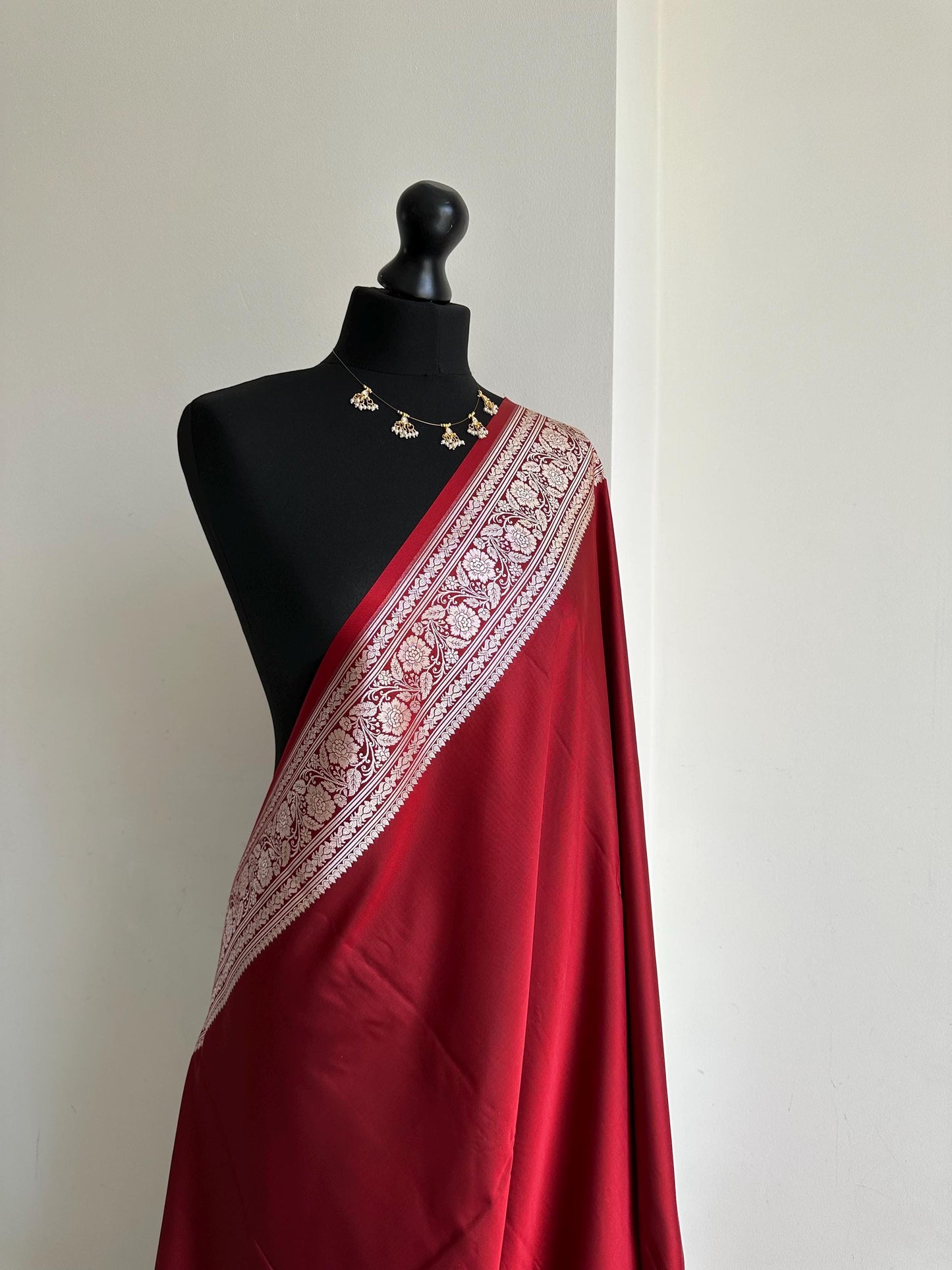 Banarasi silk crimson red katan wedding saree with gold zari. Red traditional silk saree with designer patterned blouse.