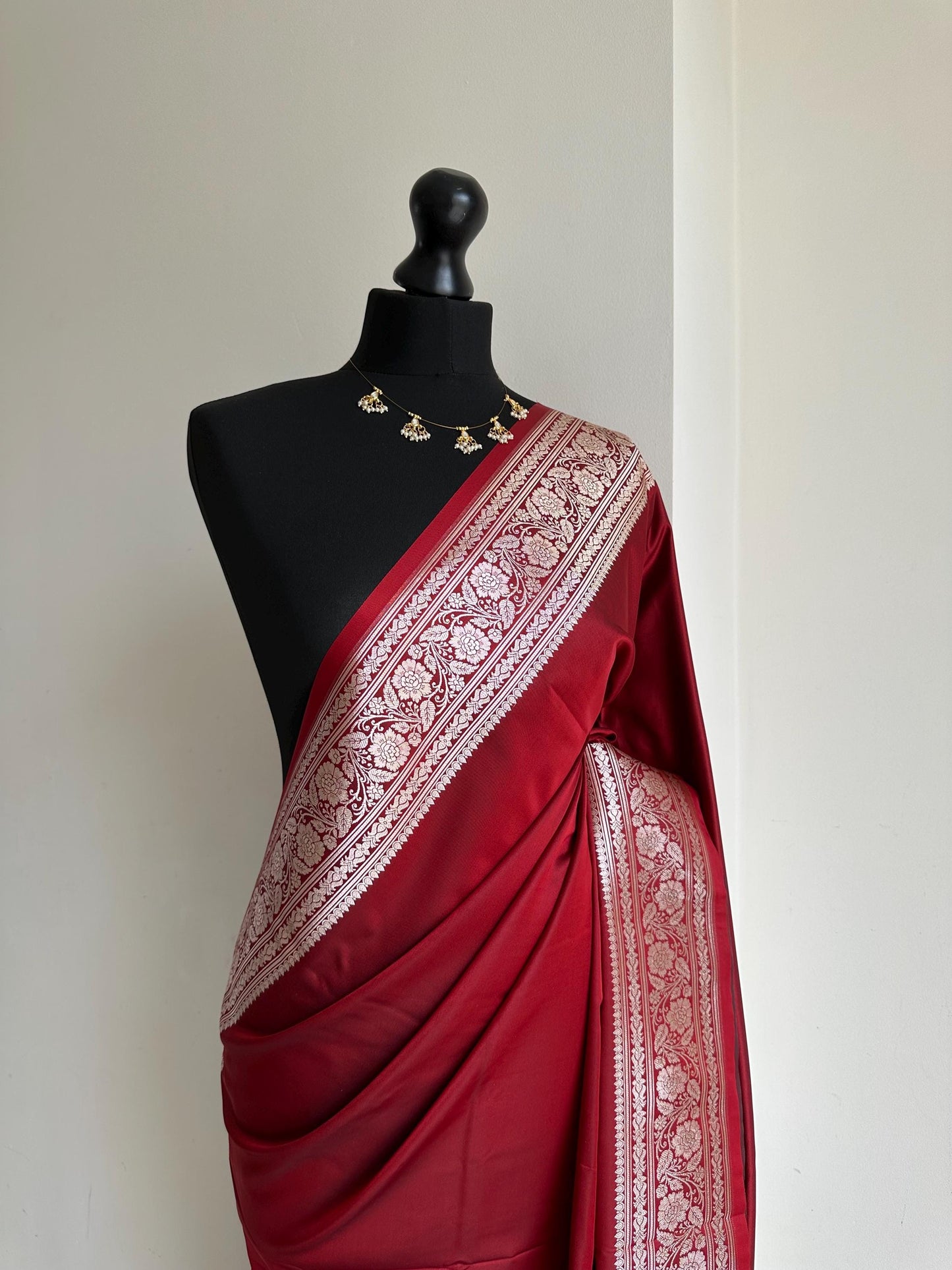 Banarasi silk crimson red katan wedding saree with gold zari. Red traditional silk saree with designer patterned blouse.