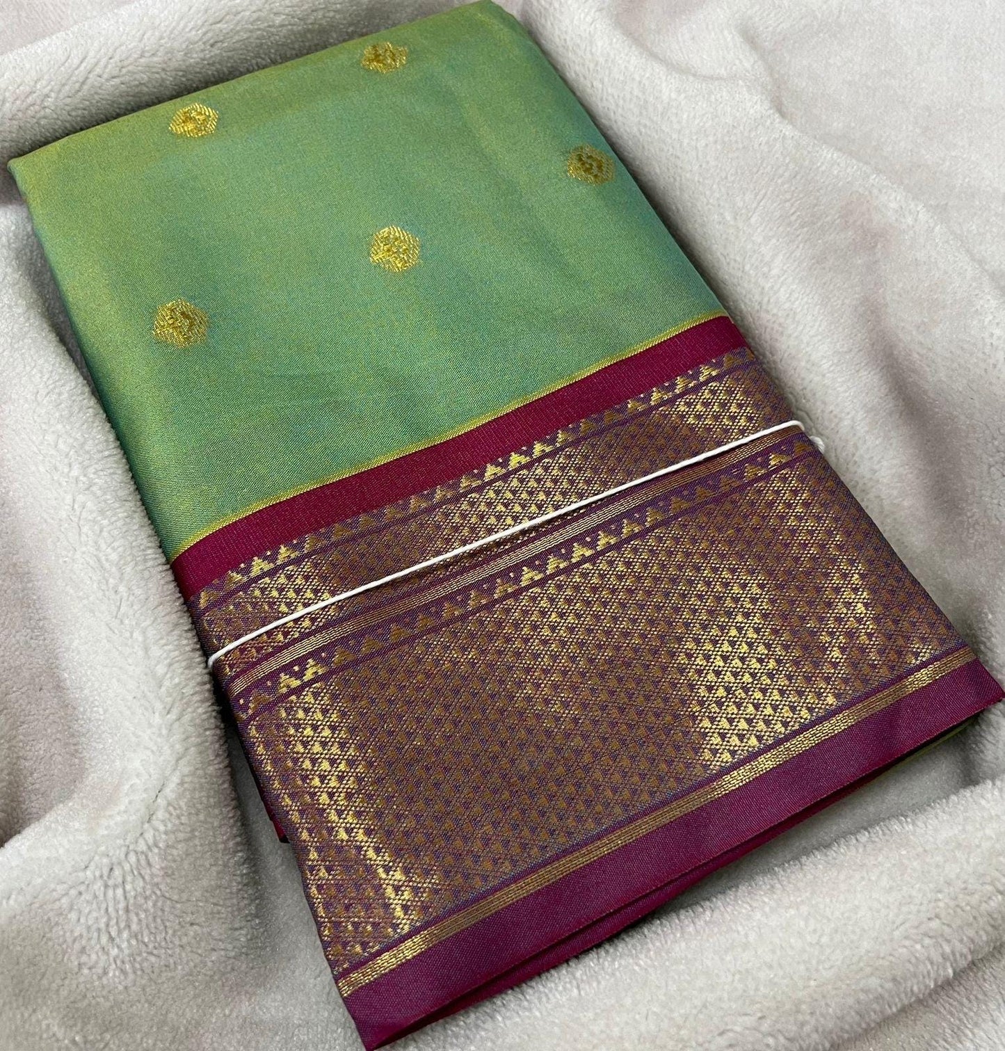 Green and pink colour saree with gold zari border and buti. Traditional semi silk saree beautiful colour and design. Designer saree