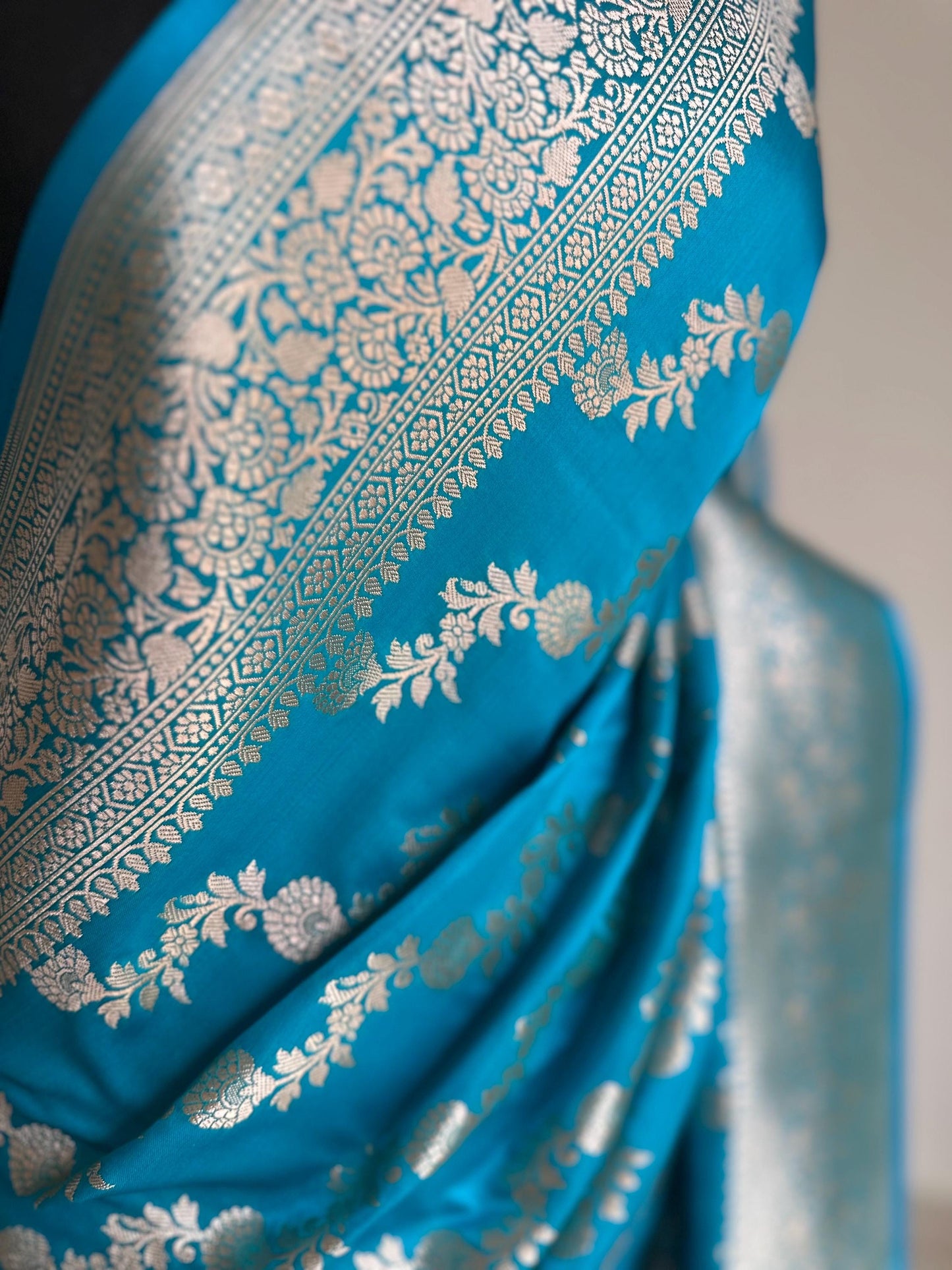 Banarasi silk peacock blue wedding saree with silver zari. Exquisite blue semi silk saree with plain contrast blouse. Stylish elegant saree