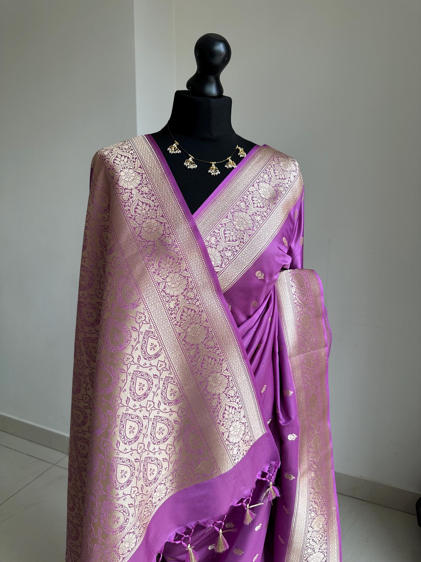 Banarasi silk lavender wedding saree with gold zari. Gold and lavender silk traditional saree with plain contrast blouse with border