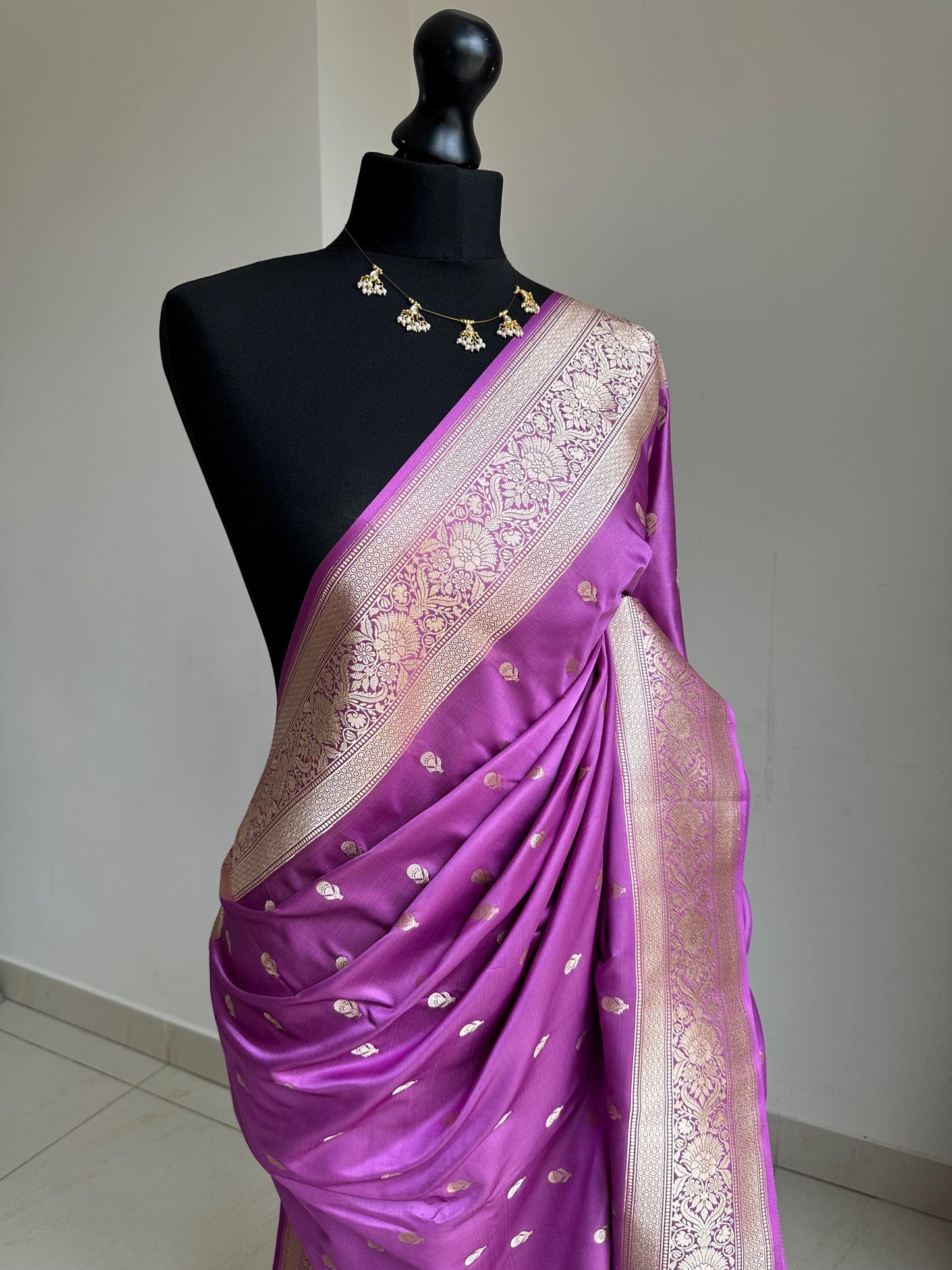 Banarasi silk lavender wedding saree with gold zari. Gold and lavender silk traditional saree with plain contrast blouse with border
