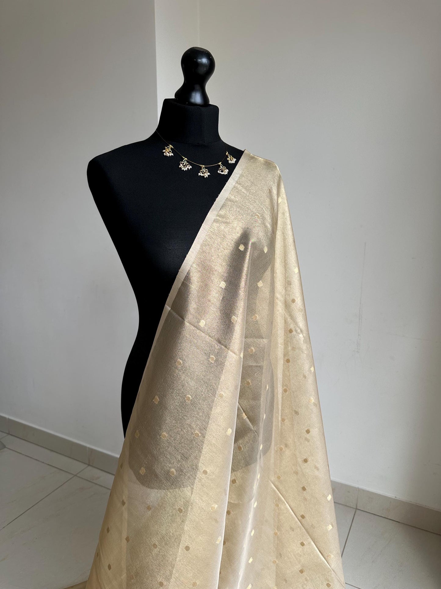 Statement handmade cream gold soft tissue saree with unstitched blouse. Gold buti pola dot wedding saree. Unique saree look for events