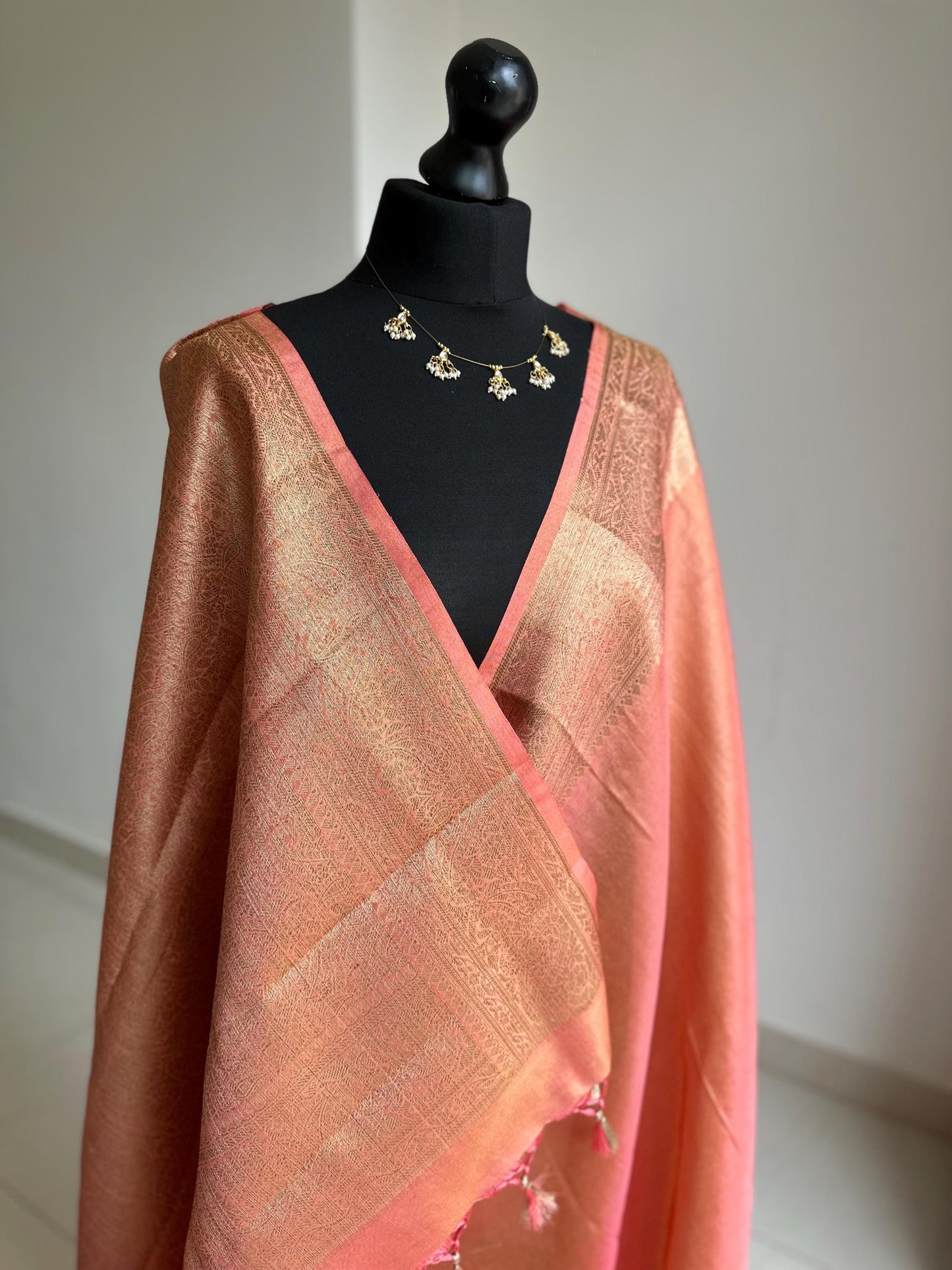Statement handmade peach coral soft tissue saree with unstitched blouse. Gold and peach wedding saree. Unique saree look for events