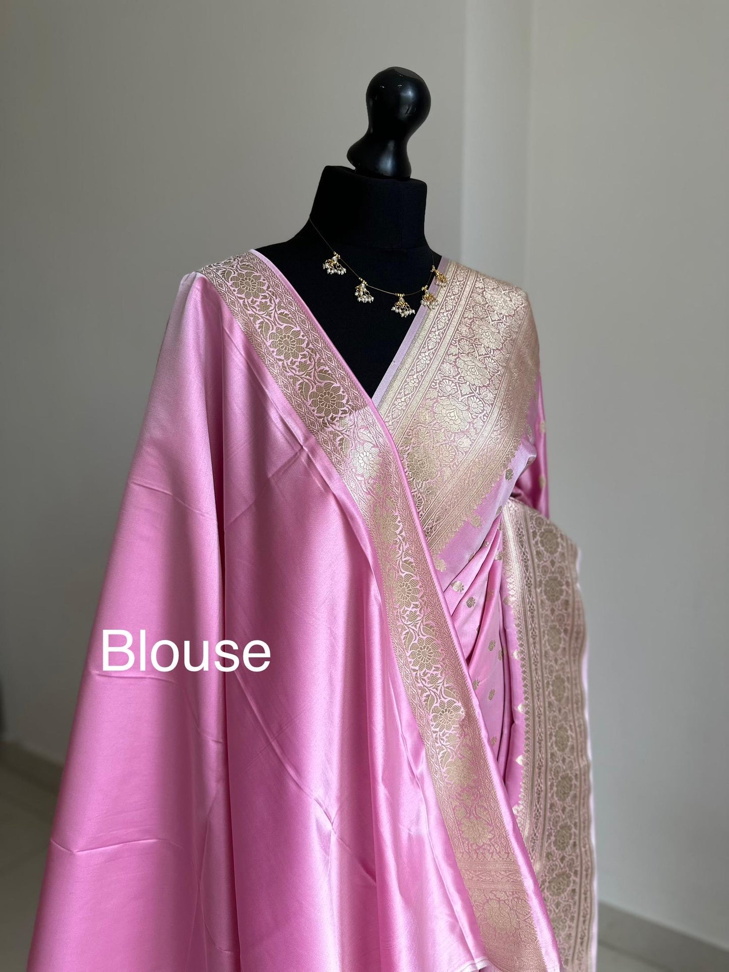 Banarasi silk soft pink wedding saree with gold zari. Gold and baby pink silk traditional saree with plain contrast blouse with border