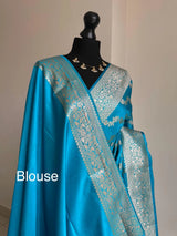 Banarasi silk peacock blue wedding saree with silver zari. Exquisite blue semi silk saree with plain contrast blouse. Stylish elegant saree LaiLai Sarees