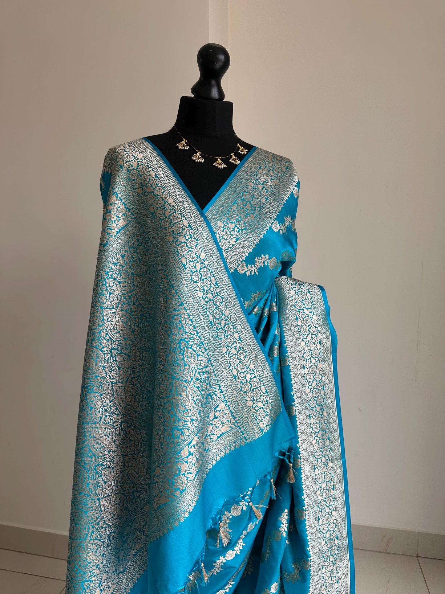 Banarasi silk peacock blue wedding saree with silver zari. Exquisite blue semi silk saree with plain contrast blouse. Stylish elegant saree