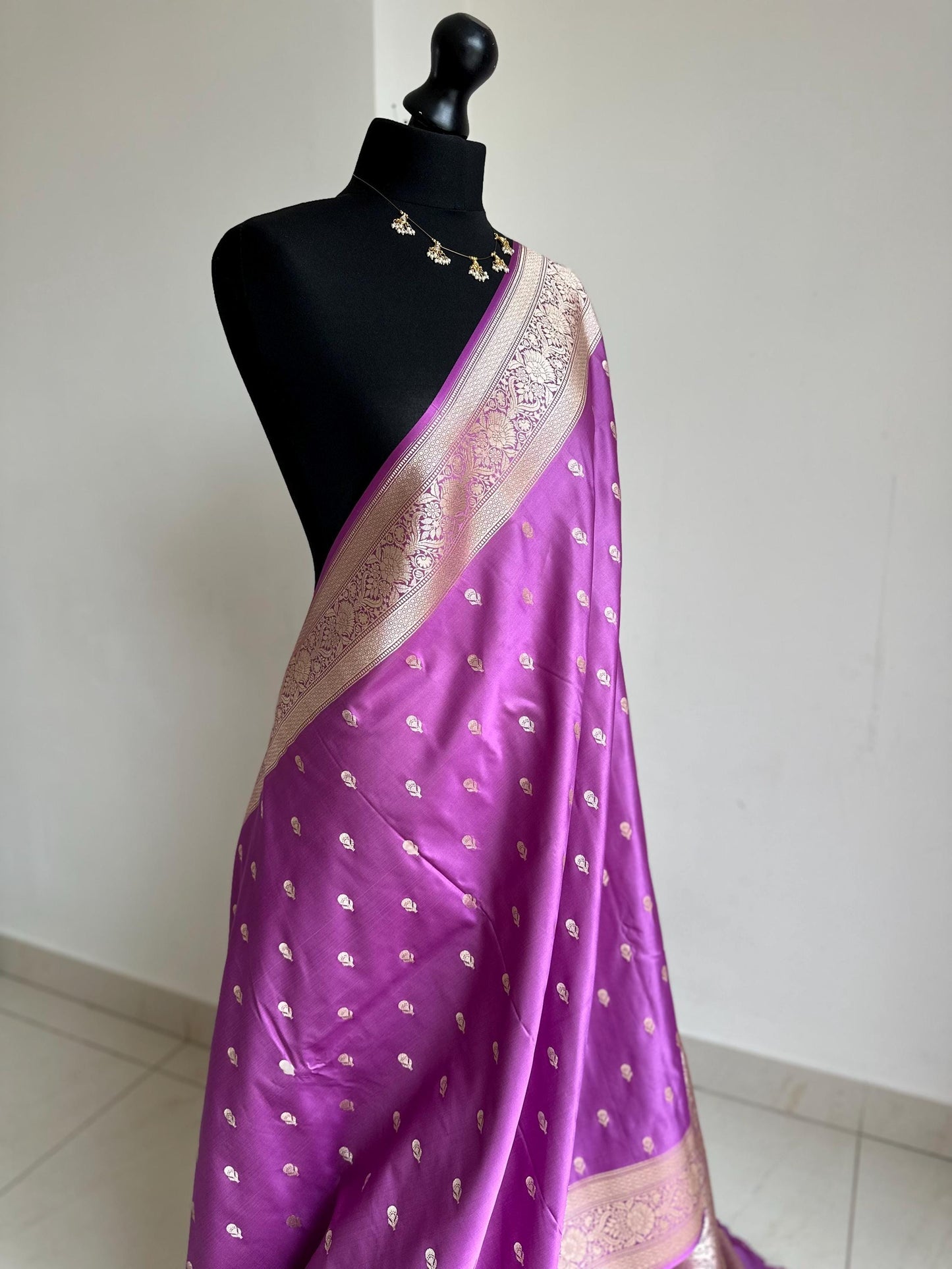 Banarasi silk lavender wedding saree with gold zari. Gold and lavender silk traditional saree with plain contrast blouse with border