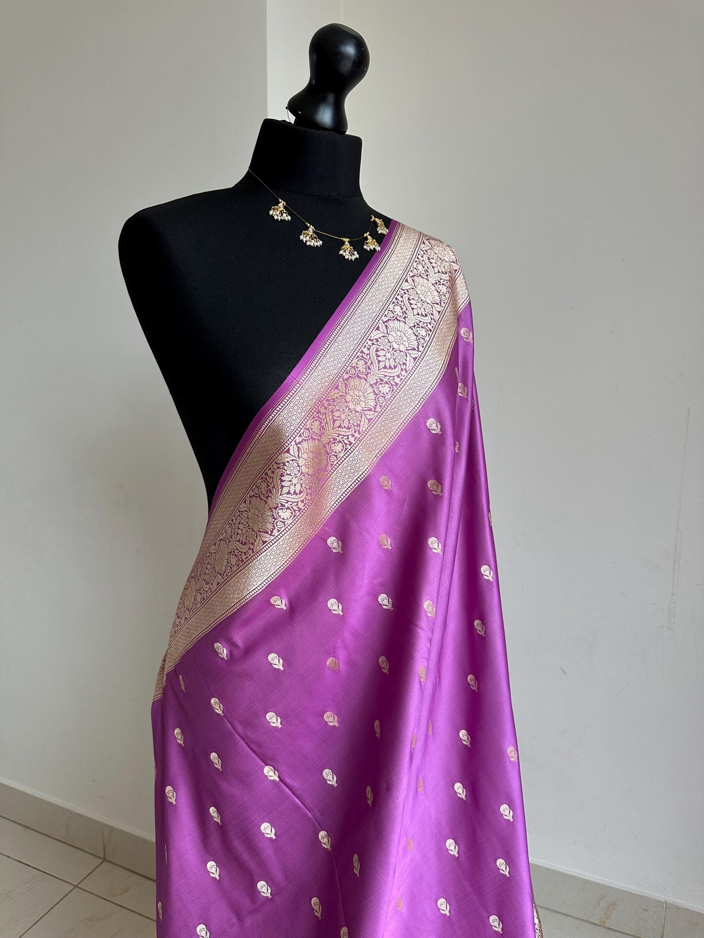 Banarasi silk lavender wedding saree with gold zari. Gold and lavender silk traditional saree with plain contrast blouse with border