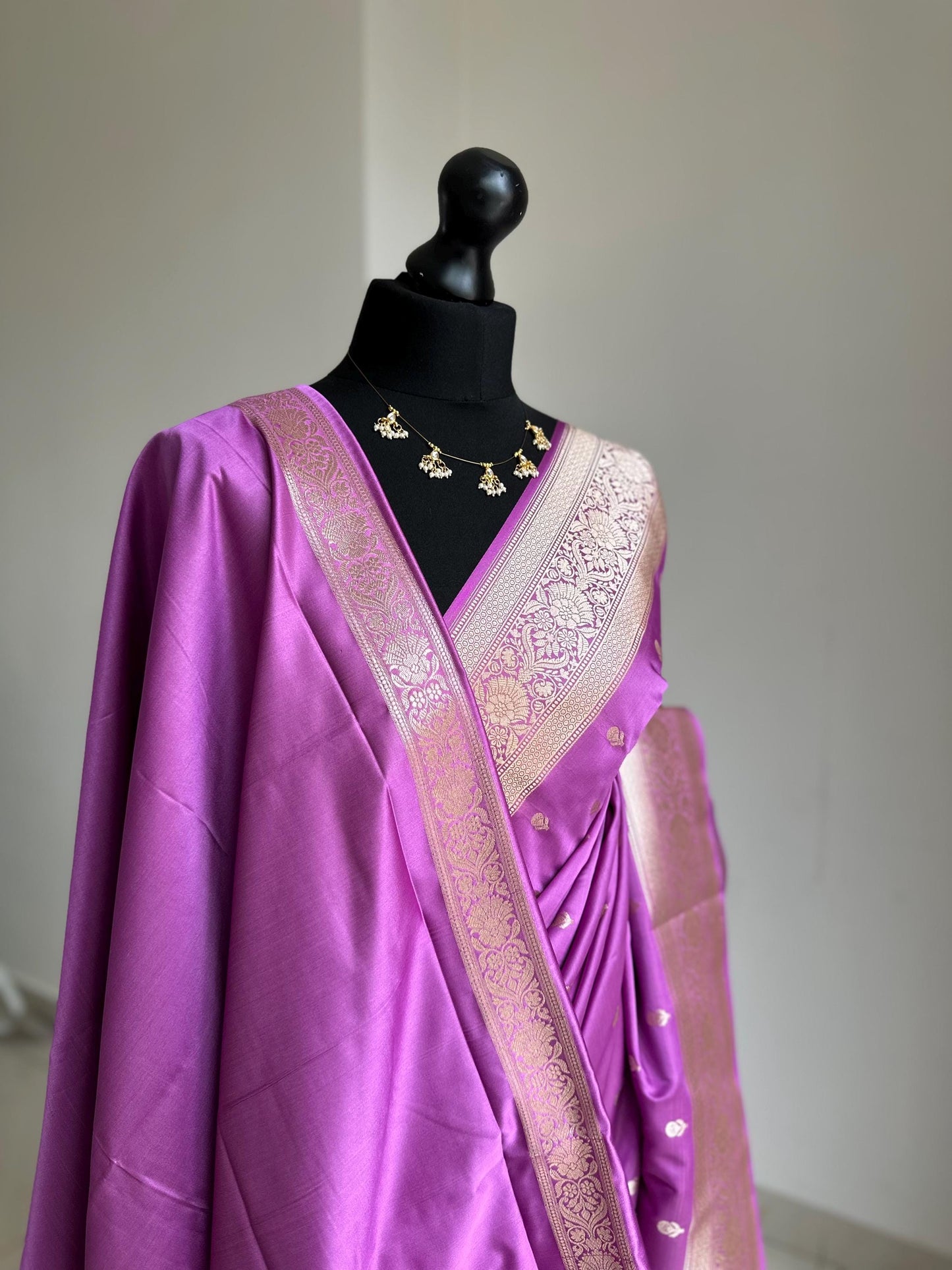 Banarasi silk lavender wedding saree with gold zari. Gold and lavender silk traditional saree with plain contrast blouse with border