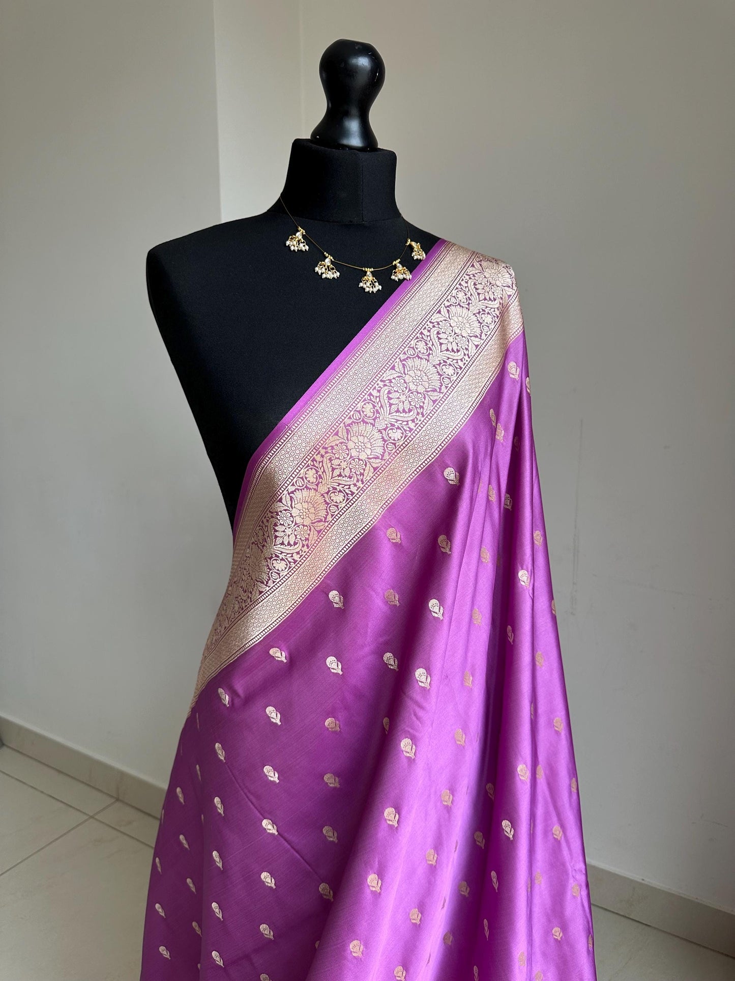 Banarasi silk lavender wedding saree with gold zari. Gold and lavender silk traditional saree with plain contrast blouse with border